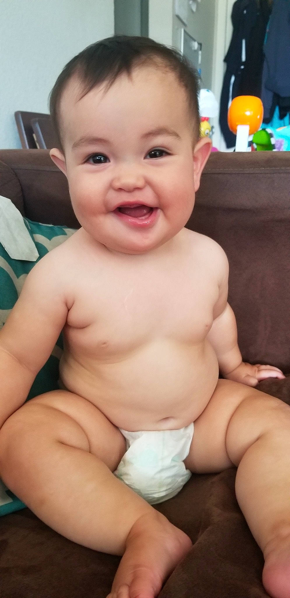 Kayloni is registered to the contest to win money with this photo: abdomen, baby, baby_making_funny_faces, barechested, cheek, chest, child, face, facial_expression, mouth, muscle, person, sitting, skin, smile, stomach, thumb, toddler, trunk