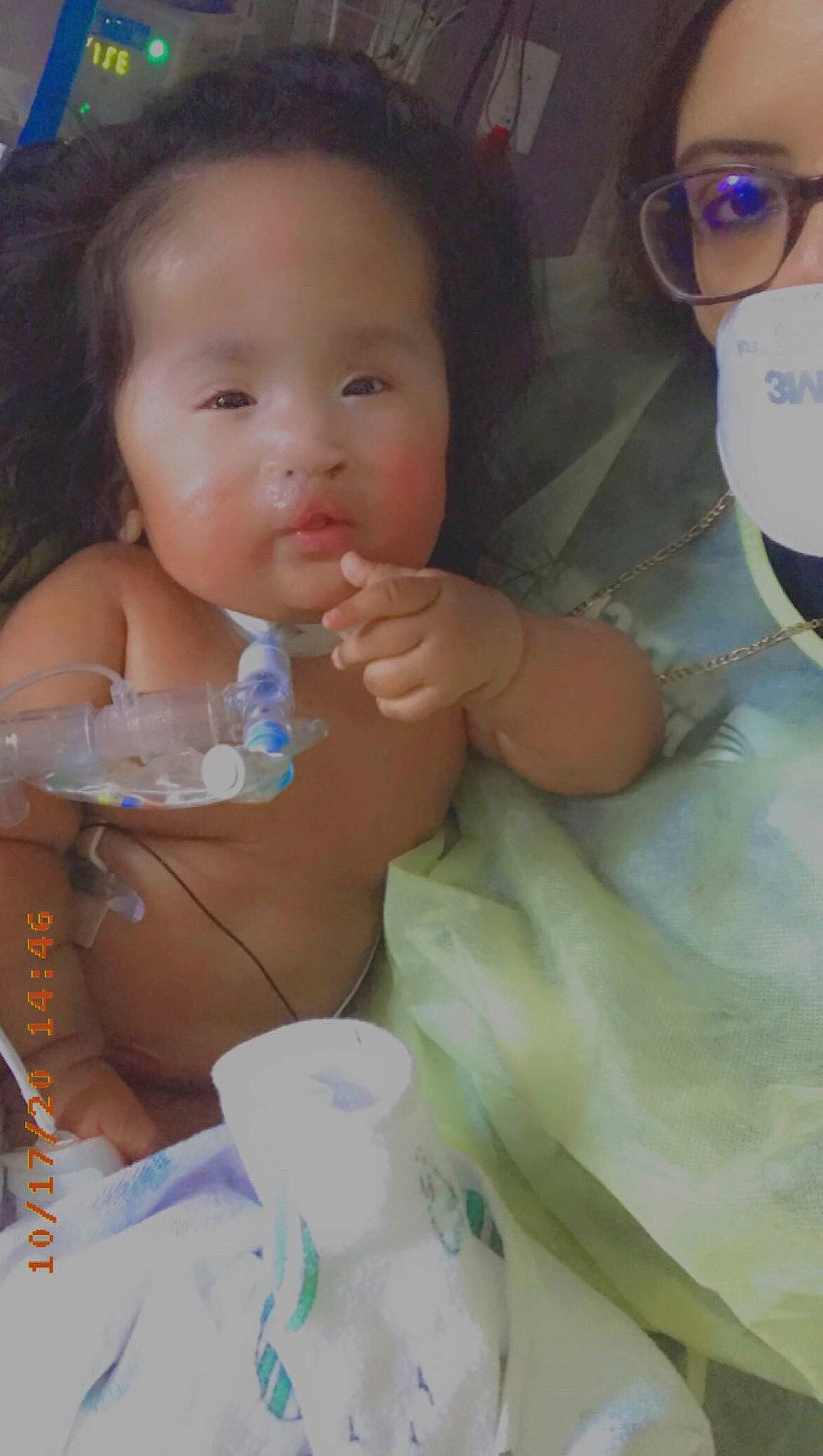 Emerli is registered to the contest to win money with this photo: baby, cheek, child, drinkware, lip, mouth, nose, person, product, skin, smile, toddler