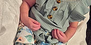 Esmeray is registered to the contest to win money with this photo: baby, blanket, child, closeup, clothing, cozy, cute, feet, floral_skirt, green_top, hands, indoors, infant, newborn, peaceful, portrait, resting, sleeping, soft_texture, toddler