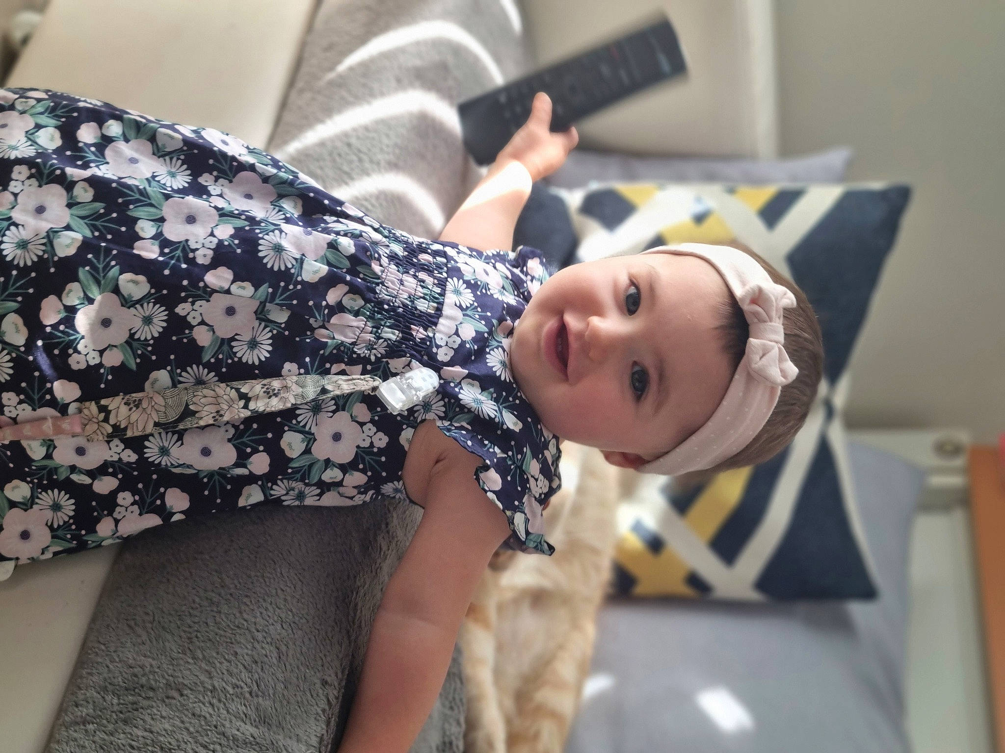 Tessa participe au concours pour gagner de l'argent avec cette photo : baby, child, comfort, dress, elbow, event, fashion_accessory, gesture, happy, headwear, human_leg, joy, nail, pattern, person, sitting, sleeve, smile, suit, thigh