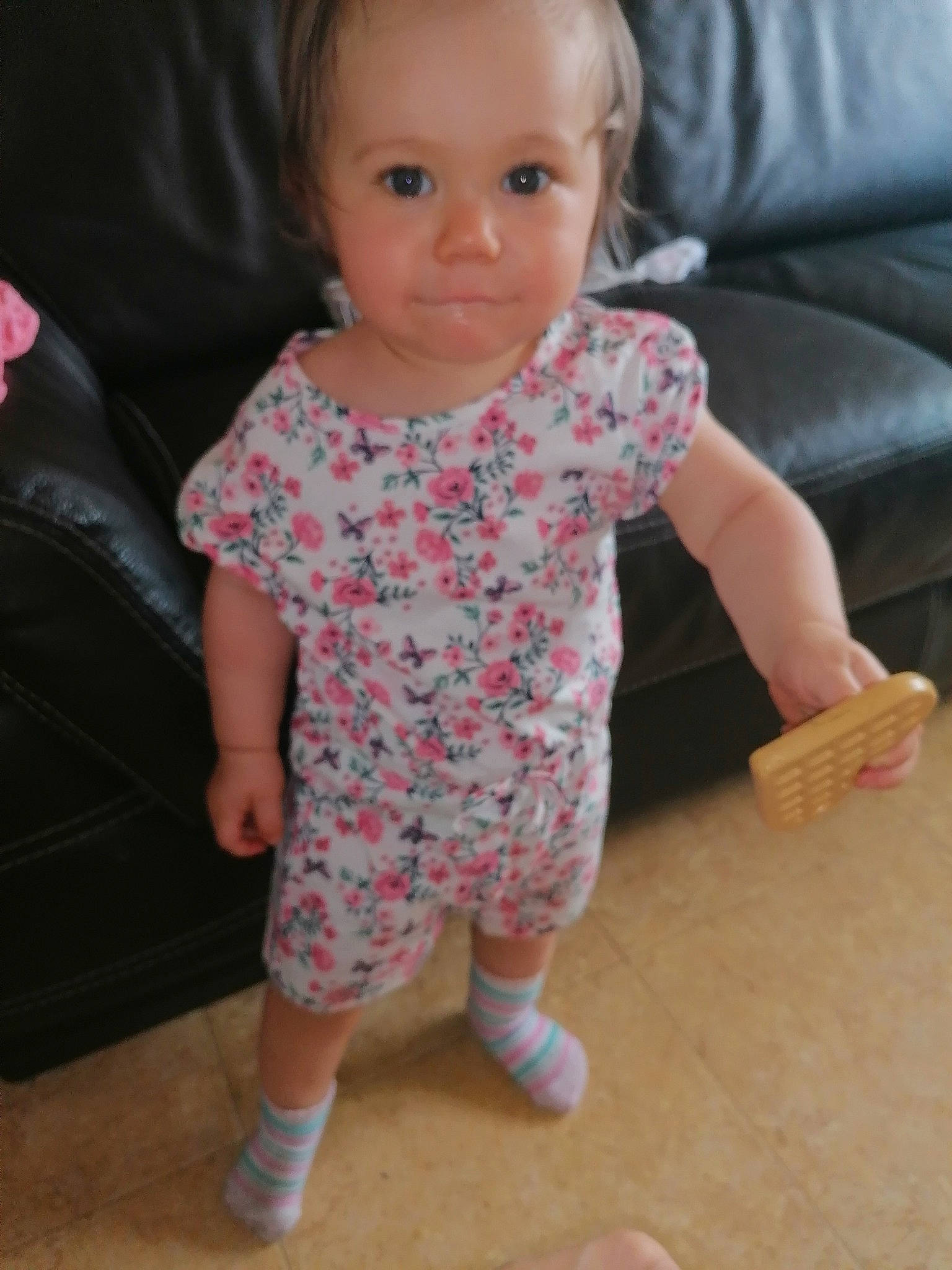 Cassy participe au concours pour gagner de l'argent avec cette photo : baby, baby_toddler_clothing, cheek, child, dress, face, head, lip, person, pink, shoe, sitting, skin, smile, standing, toddler