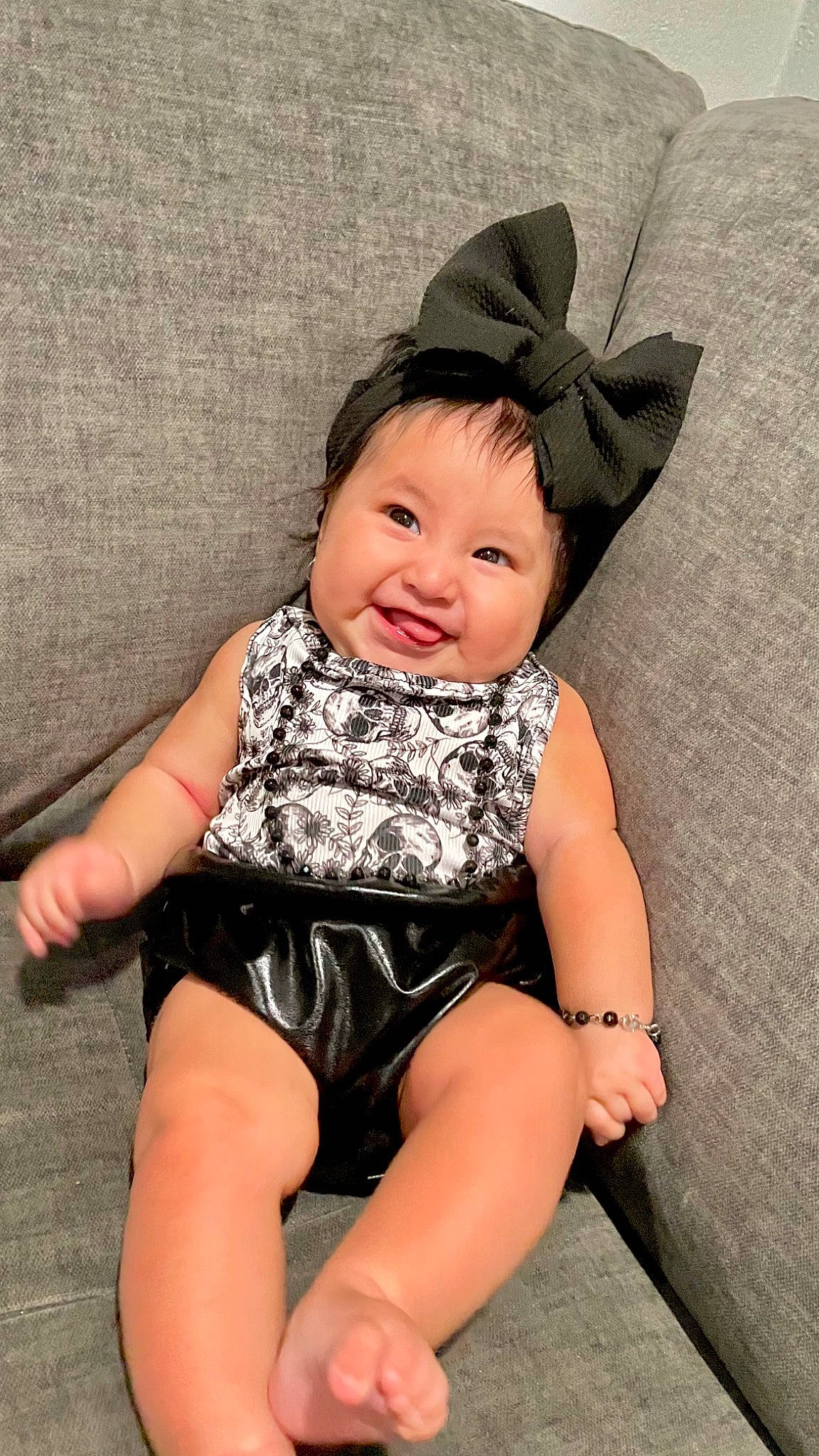 Gianna joined the competition — help win amazing prizes! baby, baby_toddler_clothing, comfort, costume_hat, eye, face, flash_photography, foot, fun, happy, head, headwear, human_leg, knee, leg, pattern, person, skin, sleeve, smile