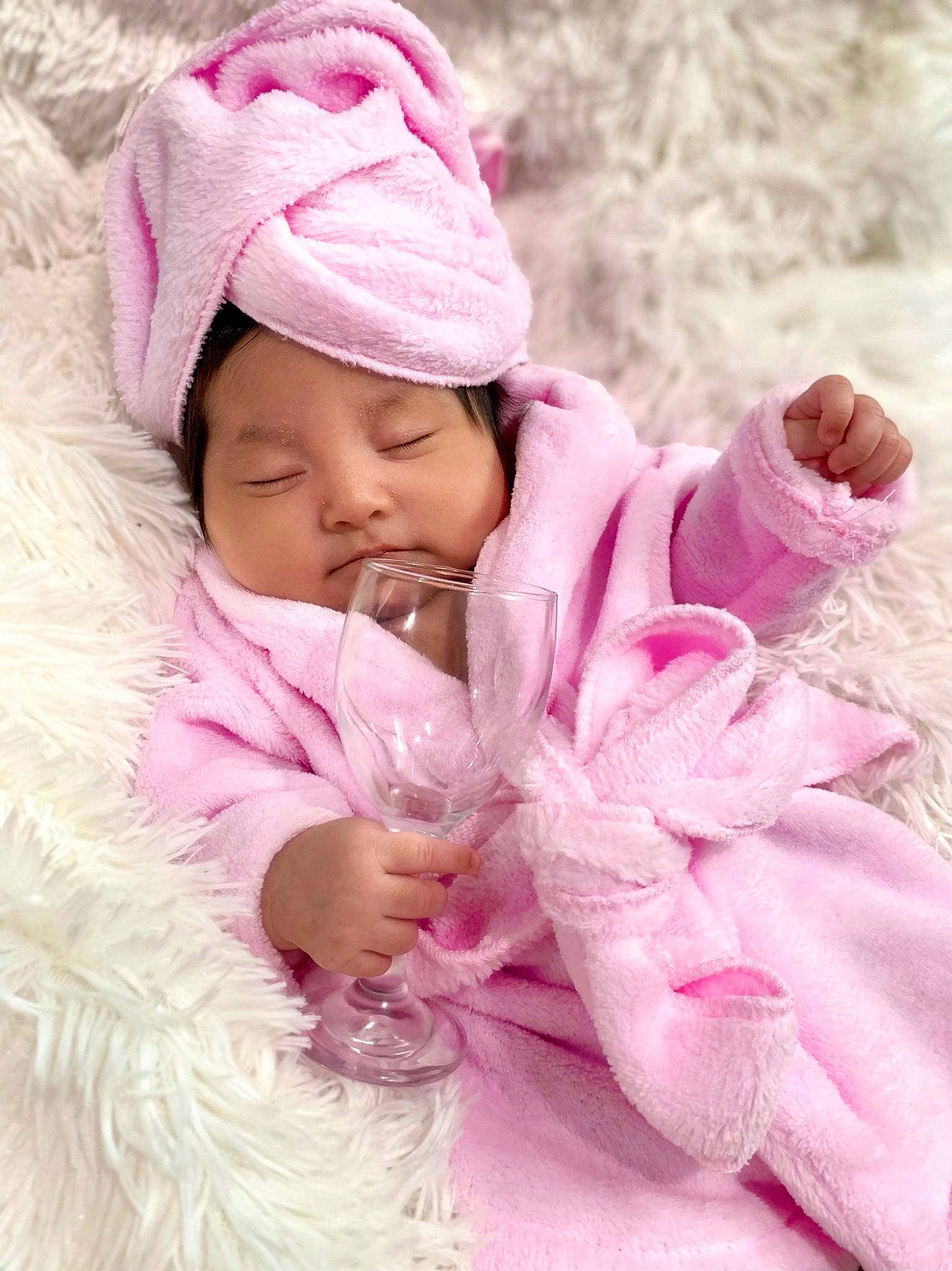 Gianna is registered to the contest to win money with this photo: baby, baby_toddler_clothing, cap, child, comfort, fashion_accessory, fur, happy, headgear, headwear, knit_cap, linens, lip, magenta, person, pink, purple, skin, sleeve, toddler