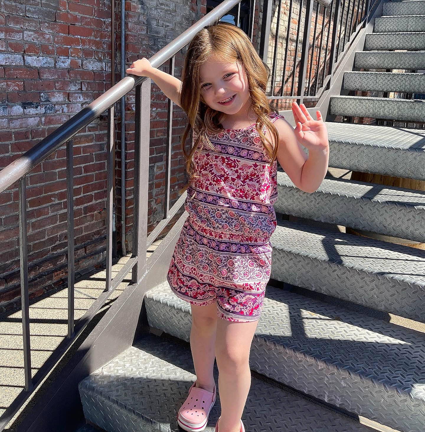 Miabella is registered to the contest to win money with this photo: dress, eyewear, face, flash_photography, foot, happy, human_leg, joy, knee, leg, leisure, long_hair, magenta, pattern, people_in_nature, person, pink, shoulder, stairs, symmetry