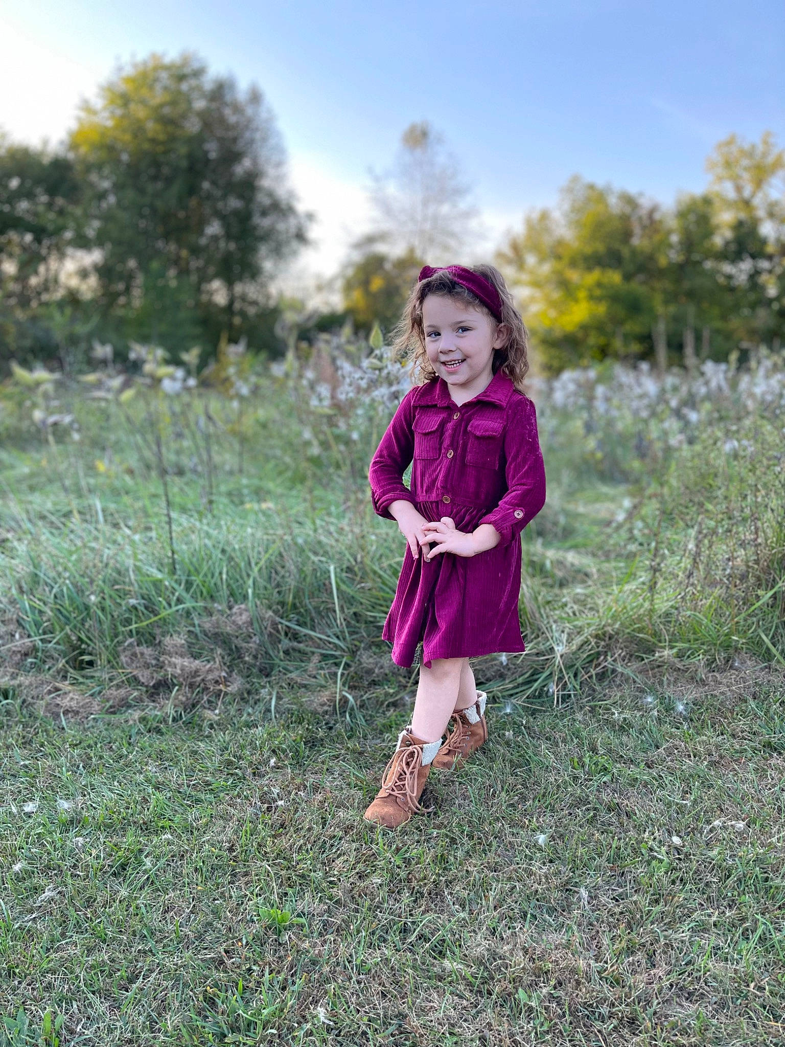 Addelyn joined the competition — help win amazing prizes! blond, clothing, dress, fawn, grass, grassland, happy, joy, landscape, magenta, meadow, natural_landscape, people_in_nature, person, pink, plant, prairie, sky, smile, summer