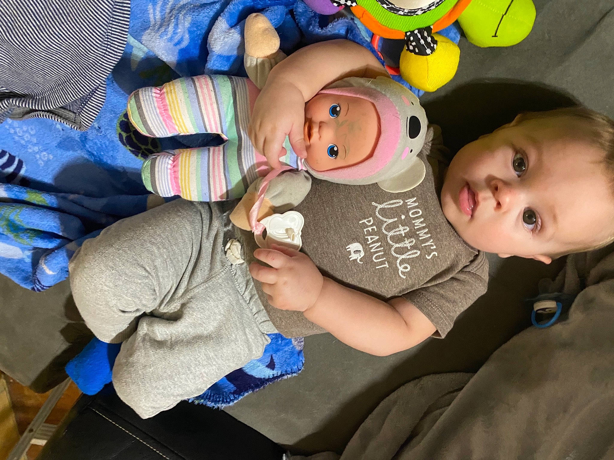 Maddox is registered to the contest to win money with this photo: baby, baby_toddler_clothing, cheek, clothing, comfort, eye, facial_expression, fun, gesture, head, headgear, mammal, mouth, people, person, stuffed_toy, surprise, textile, thumb, toddler