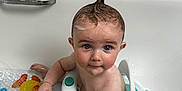 Scott joined the competition — help win amazing prizes! baby, bathtub, bath_toys, bath_seat, child, cute, face, hair, happy, indoors, moisture, person, playful, plastic, pose, portrait, skin, toy, water, wet