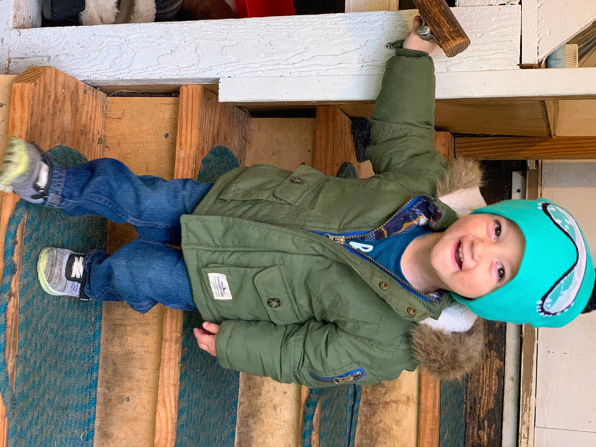 Brentlee joined the competition — help win amazing prizes! baby_toddler_clothing, bag, child, comfort, happy, hat, headgear, headwear, jacket, joint, luggage_and_bags, military_person, military_uniform, person, sitting, sleeve, smile, sneakers, toddler, uniform