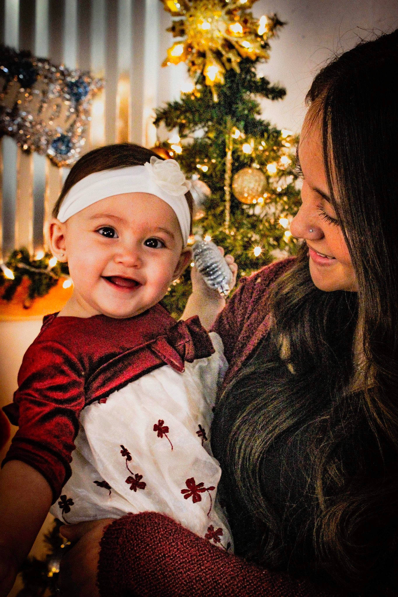 Annalise joined the competition — help win amazing prizes! baby_toddler_clothing, child, christmas, christmas_decoration, christmas_eve, christmas_ornament, christmas_tree, event, eye, facial_expression, happy, headwear, holiday, human, interior_design, joy, lighting, mouth, ornament, person