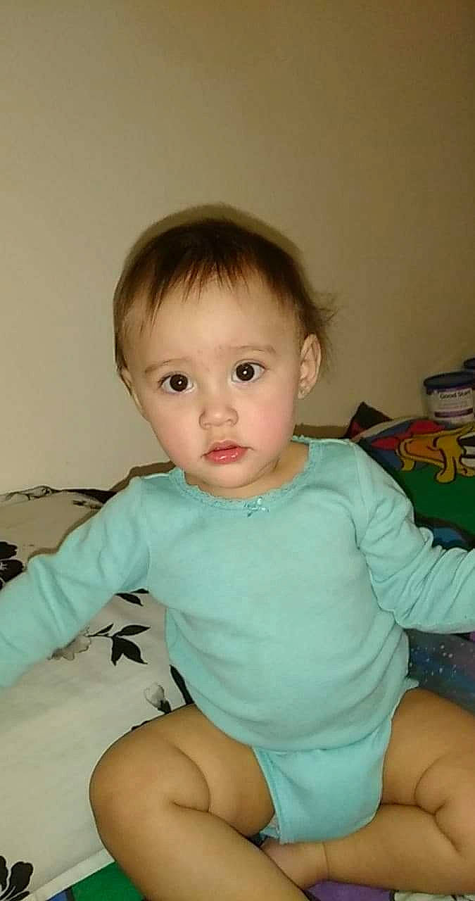 Annalise is registered to the contest to win money with this photo: baby_toddler_clothing, blond, brown_hair, cheek, child, comfort, ear, elbow, finger, forehead, iris, joint, neck, person, sitting, skin, sock, thigh, thumb, toddler