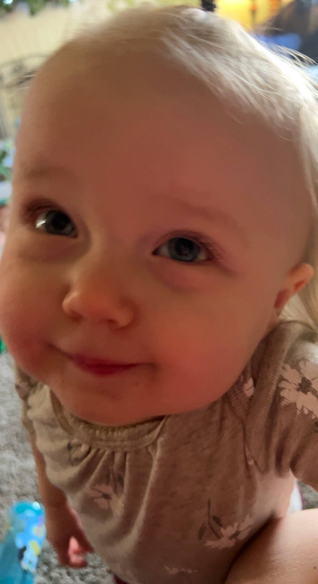 Audrey is registered to the contest to win money with this photo: baby, baby_toddler_clothing, blond, cheek, child, chin, close_up, ear, eyebrow, eyelash, forehead, happy, iris, lip, mouth, nose, person, skin, sleeve, smile