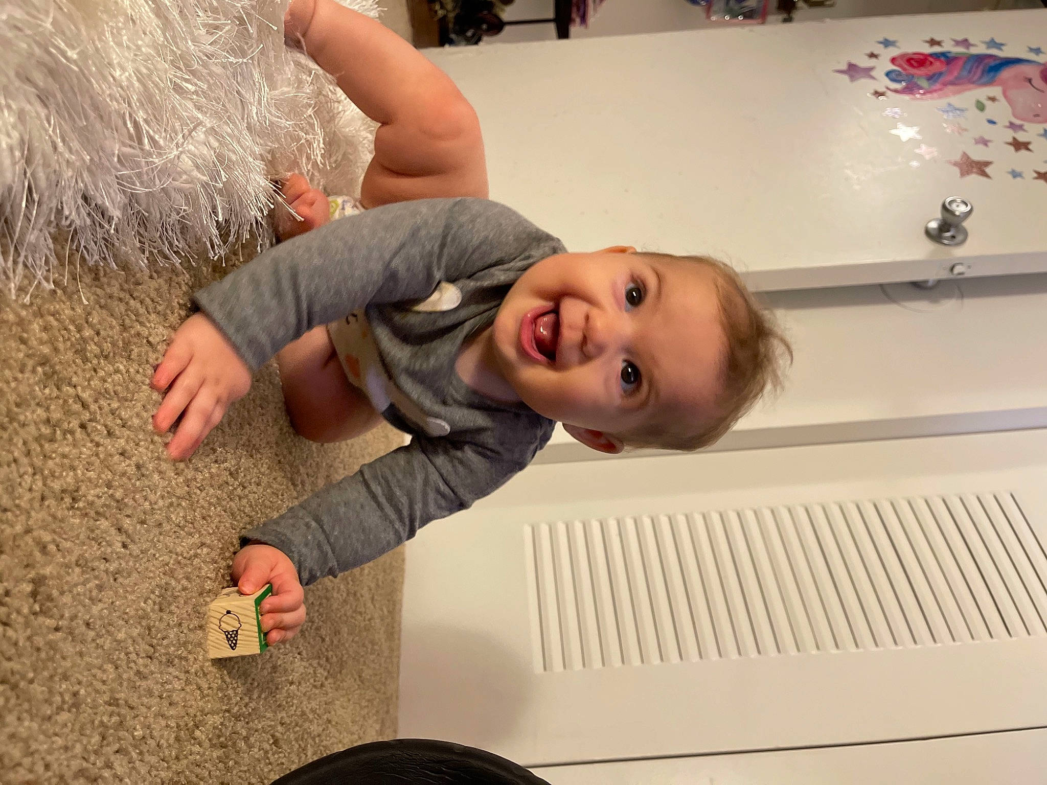 Arielle joined the competition — help win amazing prizes! automotive_tire, baby, child, finger, flooring, fun, hand, happy, laugh, leisure, person, play, room, smile, soil, toddler, wood