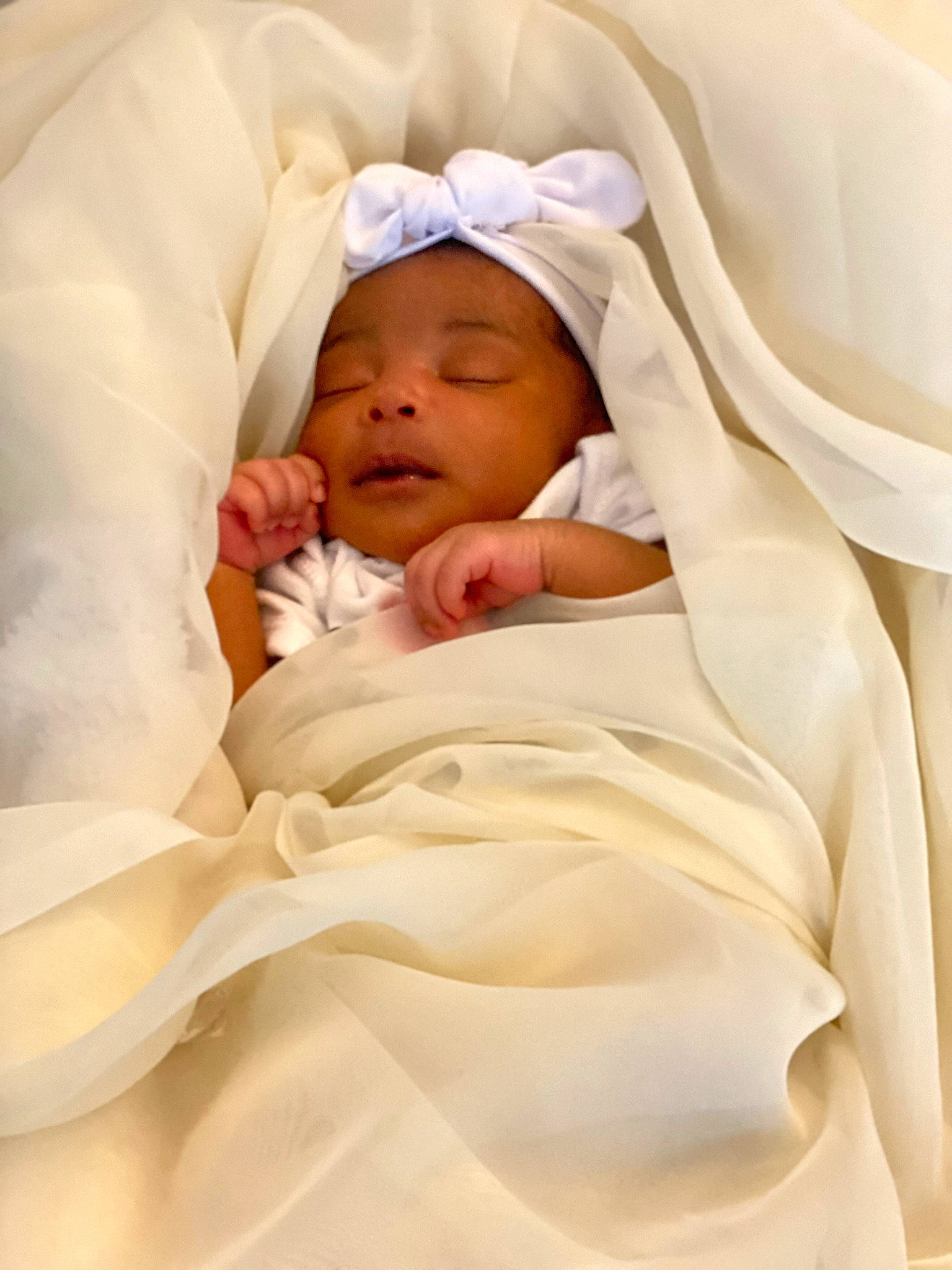 Amira is registered to the contest to win money with this photo: baby, baby_products, baby_sleeping, baby_toddler_clothing, bedtime, child, comfort, event, hat, headwear, linens, nap, peach, person, room, sleep, thumb, toddler