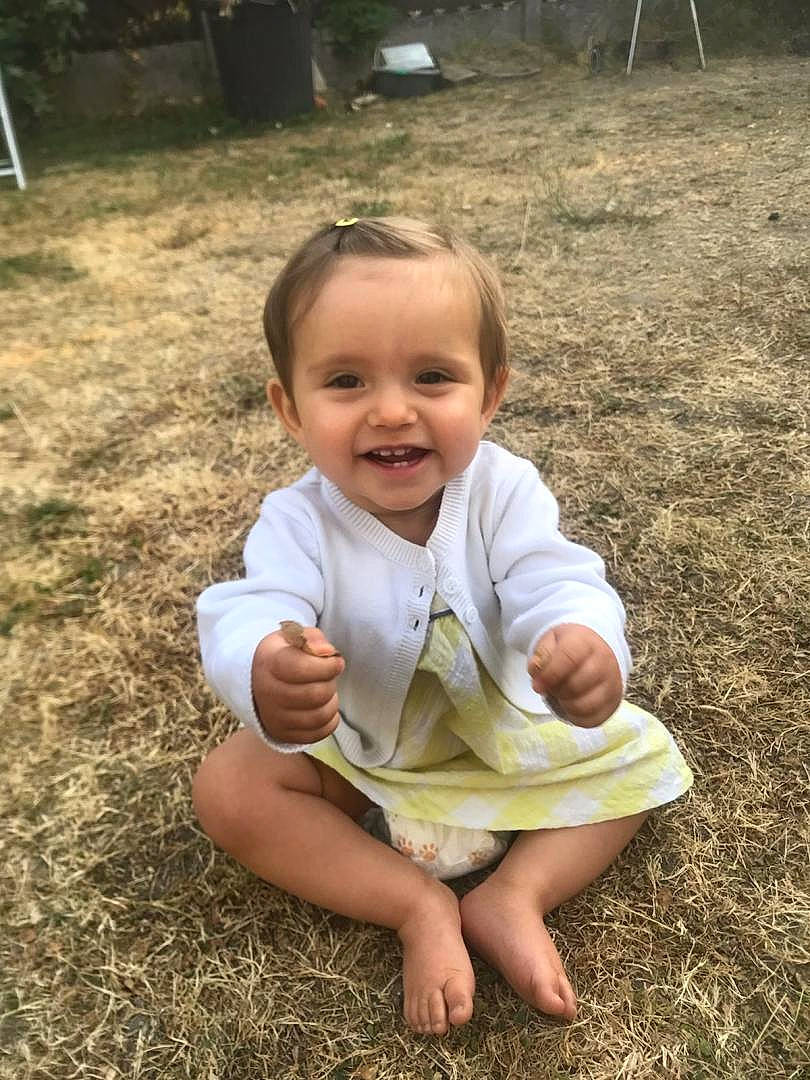 Lana participe au concours pour gagner de l'argent avec cette photo : baby, baby_toddler_clothing, ball, cheek, child, chin, flash_photography, fun, gesture, grass, hand, happy, joy, leaf, mammal, mouth, nose, people_in_nature, person, skin