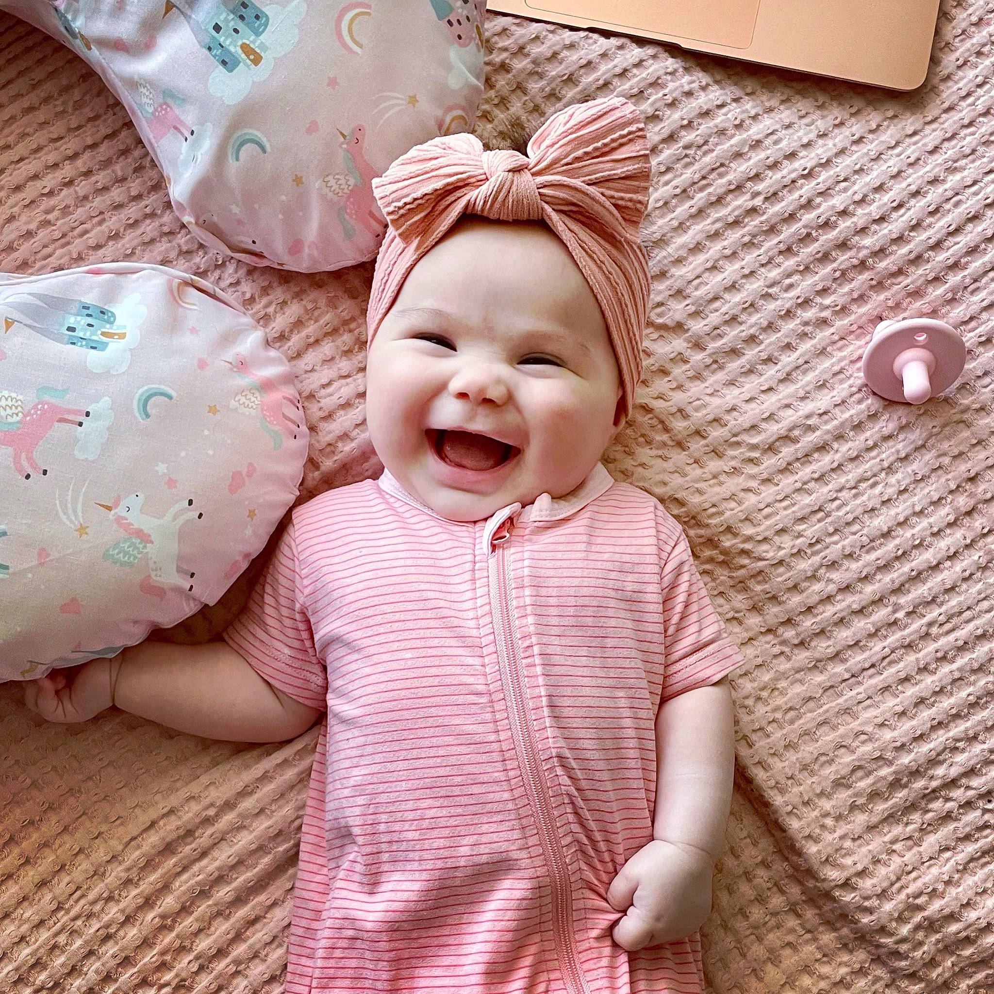 Raven joined the competition — help win amazing prizes! baby, baby_laughing, baby_sleeping, baby_toddler_clothing, child, comfort, face, fun, happy, headwear, laugh, linens, magenta, pattern, peach, person, pink, skin, sleeve, smile