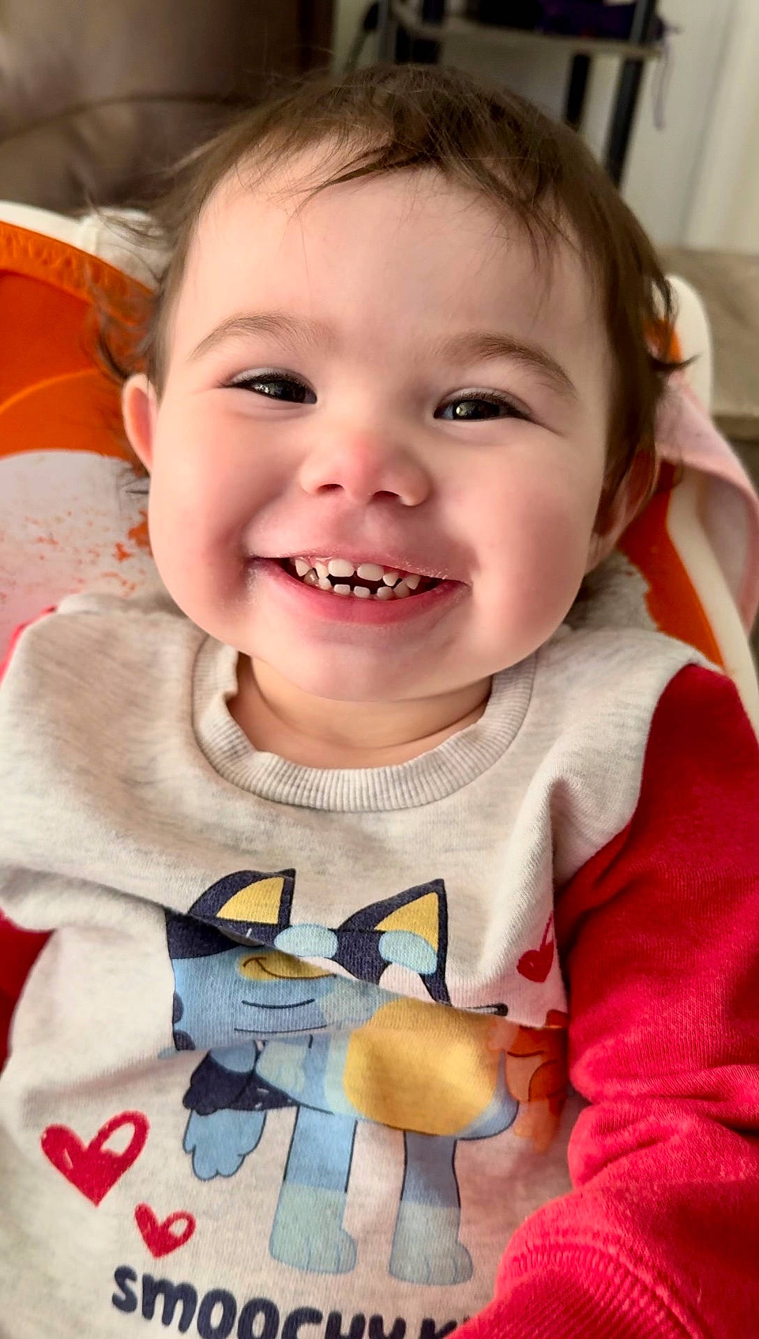 Raven joined the competition — help win amazing prizes! applique, baby, babylaughing, bodypart, clothing, coat, face, happy, head, jacket, knitwear, laughing, mouth, pattern, person, photography, portrait, smile, t_shirt, teeth