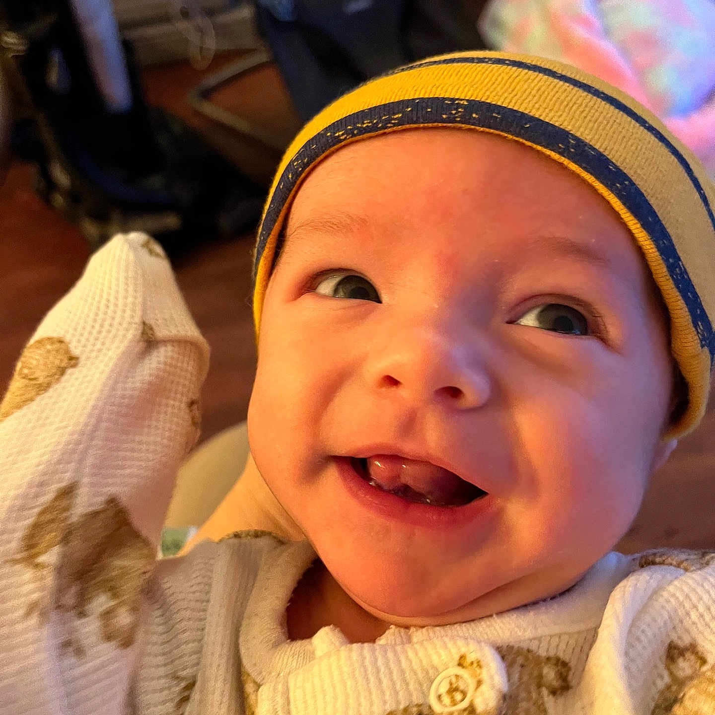 Miles joined the competition — help win amazing prizes! baby, beanie, bodypart, bonnet, cap, clothing, coat, face, happy, hat, head, jacket, laughing, mouth, newborn, person, photography, portrait, smile, teeth