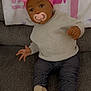 Symora is registered to the contest to win money with this photo: baby, bodypart, clothing, couch, face, finger, footwear, furniture, hand, hat, head, jeans, knitwear, pants, person, photography, portrait, shoe, sitting, toy