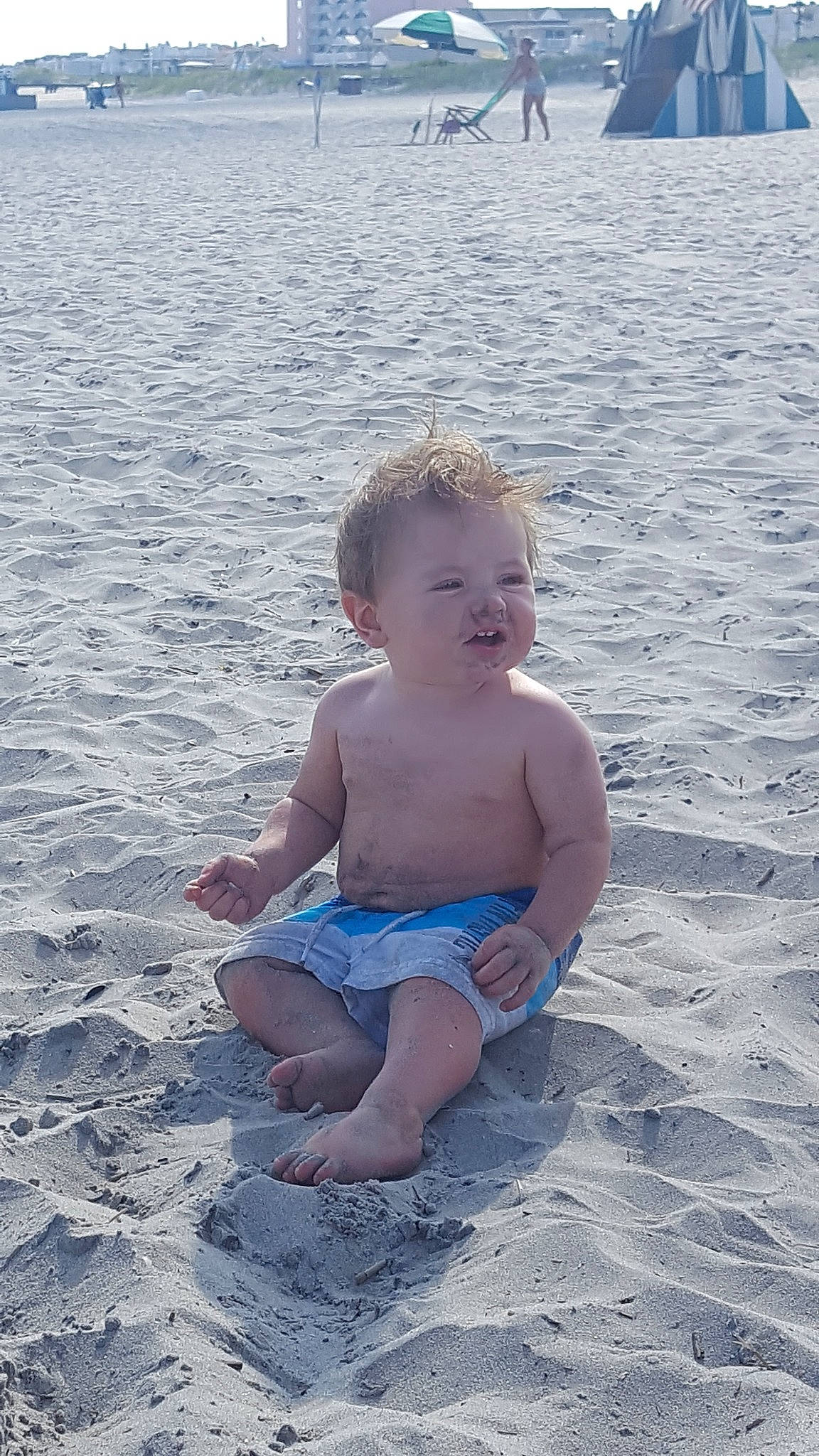 Gunner joined the competition — help win amazing prizes! beach, body_of_water, child, coastal_and_oceanic_landforms, fun, girl, leg, leisure, ocean, person, recreation, sand, sea, summer, swimwear, toddler, vacation, water, wave