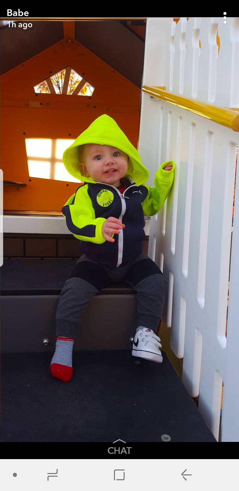 Gunner is registered to the contest to win money with this photo: boy, child, clothing, costume, day, fun, headwear, outerwear, person, play, product, standing, toddler, yellow