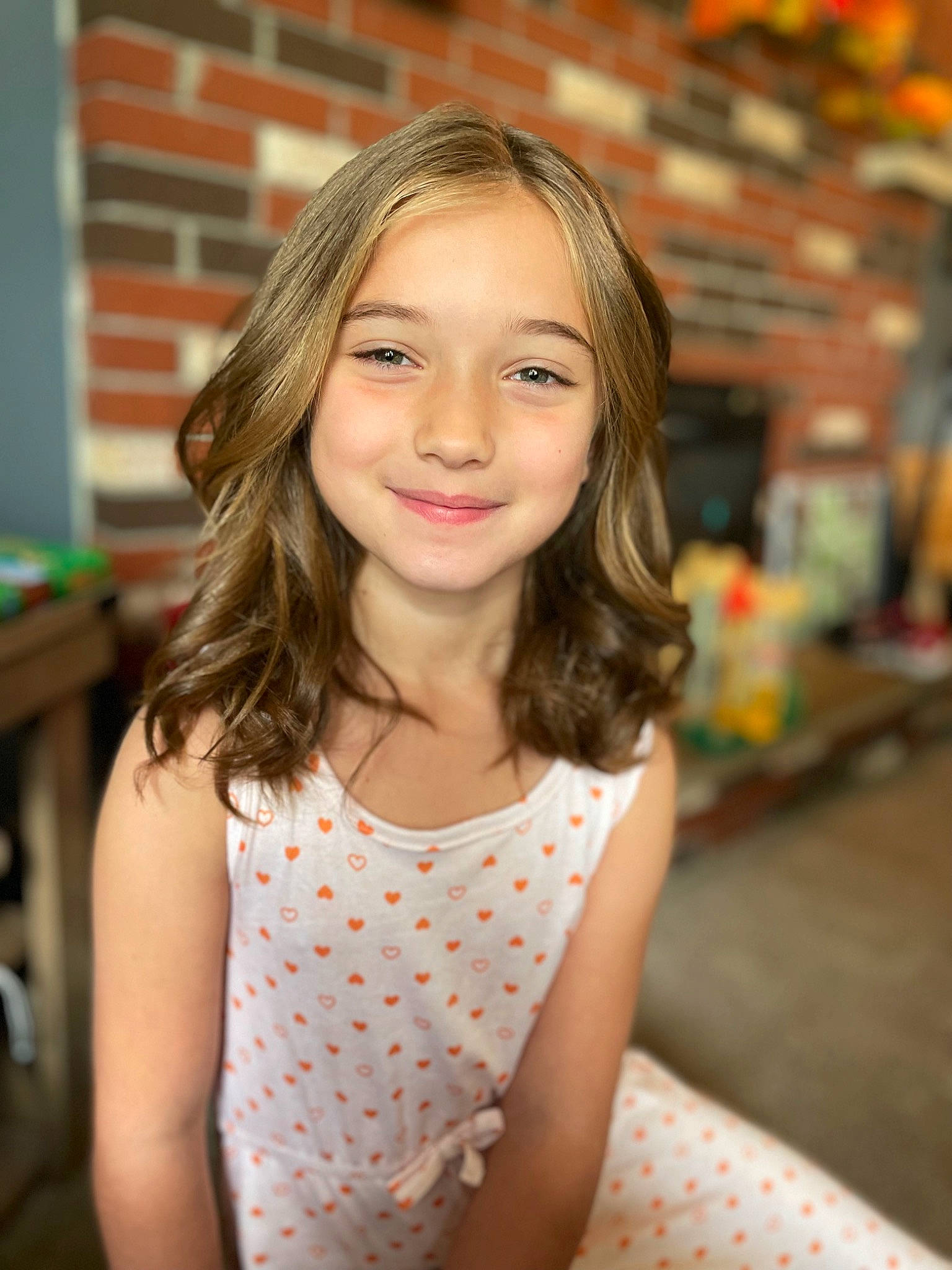 Sydney is registered to the contest to win money with this photo: beauty, blond, brown_hair, child, day_dress, dress, flash_photography, fun, happy, joy, layered_hair, leisure, long_hair, pattern, person, photo_shoot, portrait, portrait_photography, sitting, skin