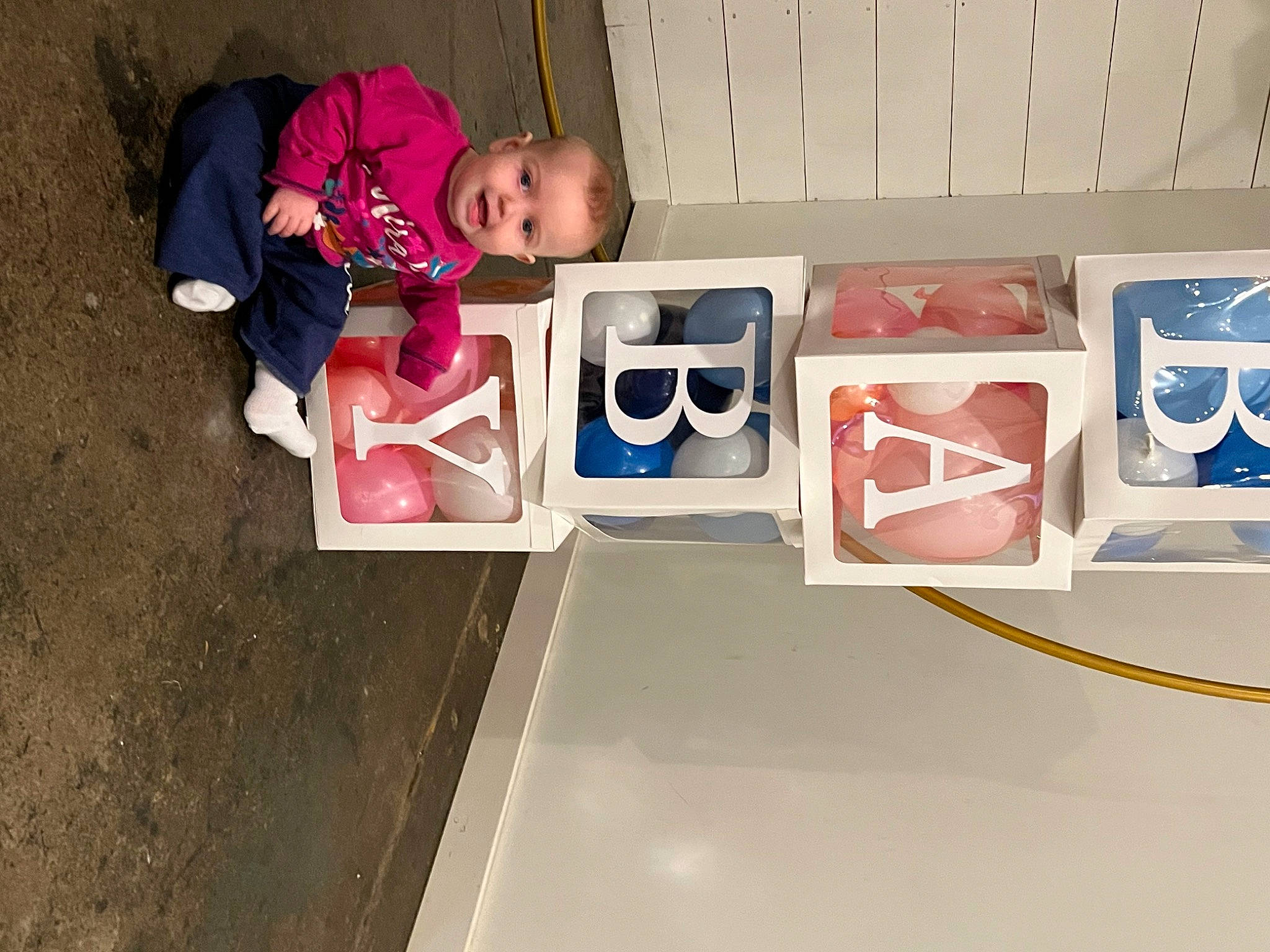 Cecilia is registered to the contest to win money with this photo: baby, baby_toddler_clothing, carmine, child, flooring, fun, gas, laundry_room, paint, person, play, room, t_shirt, toddler, visual_arts, wood