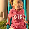 Harlee is registered to the contest to win money with this photo: child, girl, blonde_hair, pigtails, pink_shirt, text_on_clothing, slide, playground, outdoor, smile, happy, sunlight, floral_skirt, grass, play, fun, young_child, casual_clothing, daylight, portrait