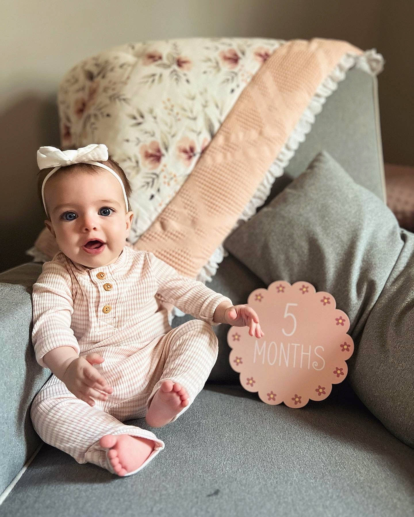 Avalee joined the competition — help win amazing prizes! baby, baby_products, baby_sleeping, baby_toddler_clothing, child, comfort, fashion_accessory, foot, headgear, linens, pattern, person, pink, room, sitting, sleeve, sock, stuffed_toy, textile, throw_pillow