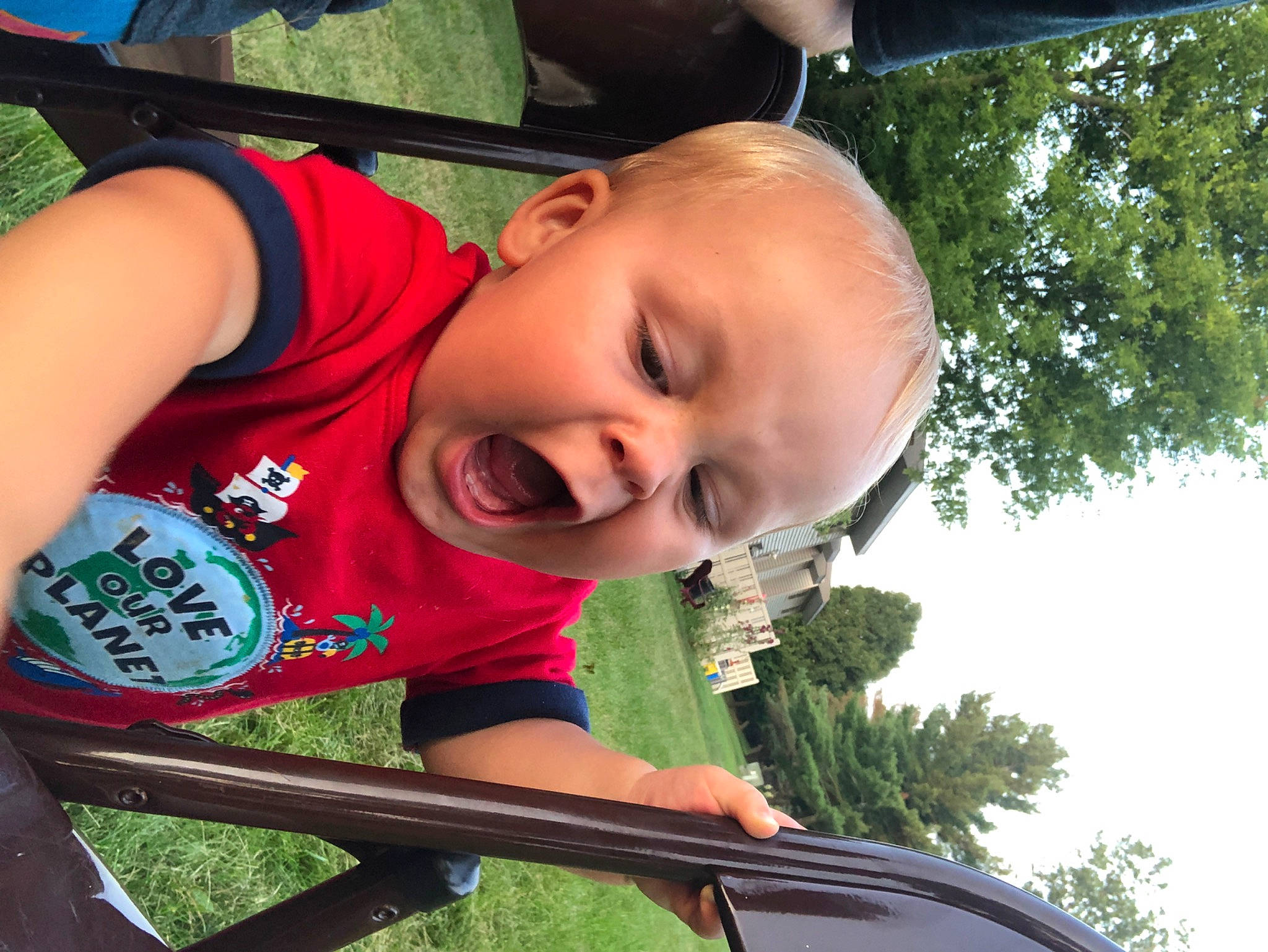 Rowan is registered to the contest to win money with this photo: child, glass, happy, leisure, person, play, smile, toddler, vacation, window