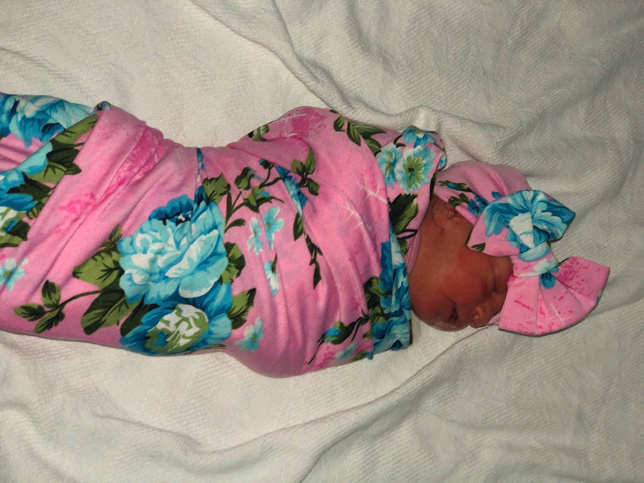 Mikaela is registered to the contest to win money with this photo: baby, baby_products, baby_toddler_clothing, bedtime, child, comfort, fashion_accessory, hat, linens, magenta, nap, pattern, peach, person, pink, plant, sleep, sleeve, t_shirt, toddler