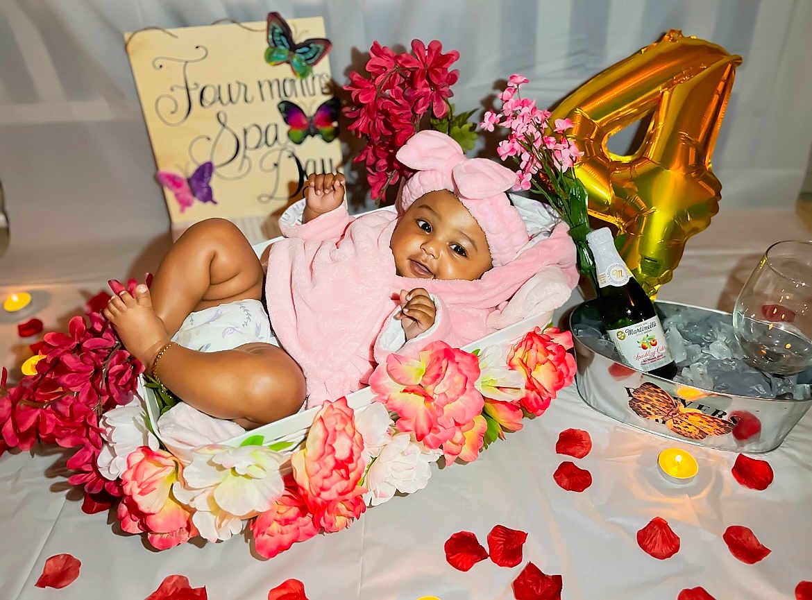 Rayneris joined the competition — help win amazing prizes! baby, balloon, bottle, butterfly_decor, candle, celebration, cute, flower_basket, flowers, headband, ice_bucket, indoor, infant, number_4, pink_clothing, portrait, rose_petals, roses, smiling, table