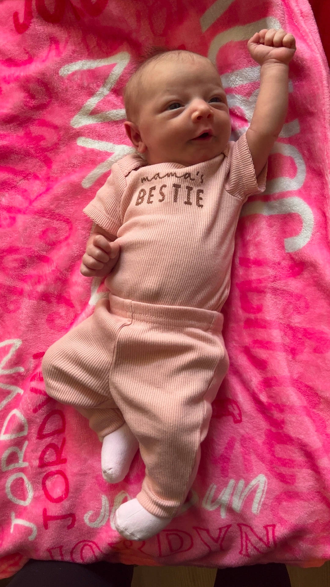 baby, bed, blanket, bodypart, clothing, cushion, face, finger, furniture, glove, hand, head, newborn, pants, person, photography, portrait, quilt, sleeping, towel