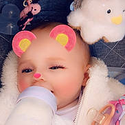 Dolly-Mae joined the competition — help win amazing prizes! adorable, baby, bottle, child, closeup, cute, face, feeding, filter, fluffy_jacket, hearts, indoor, infant, pacifier, pink, smile, soft_toys, toy, warm_clothing, white