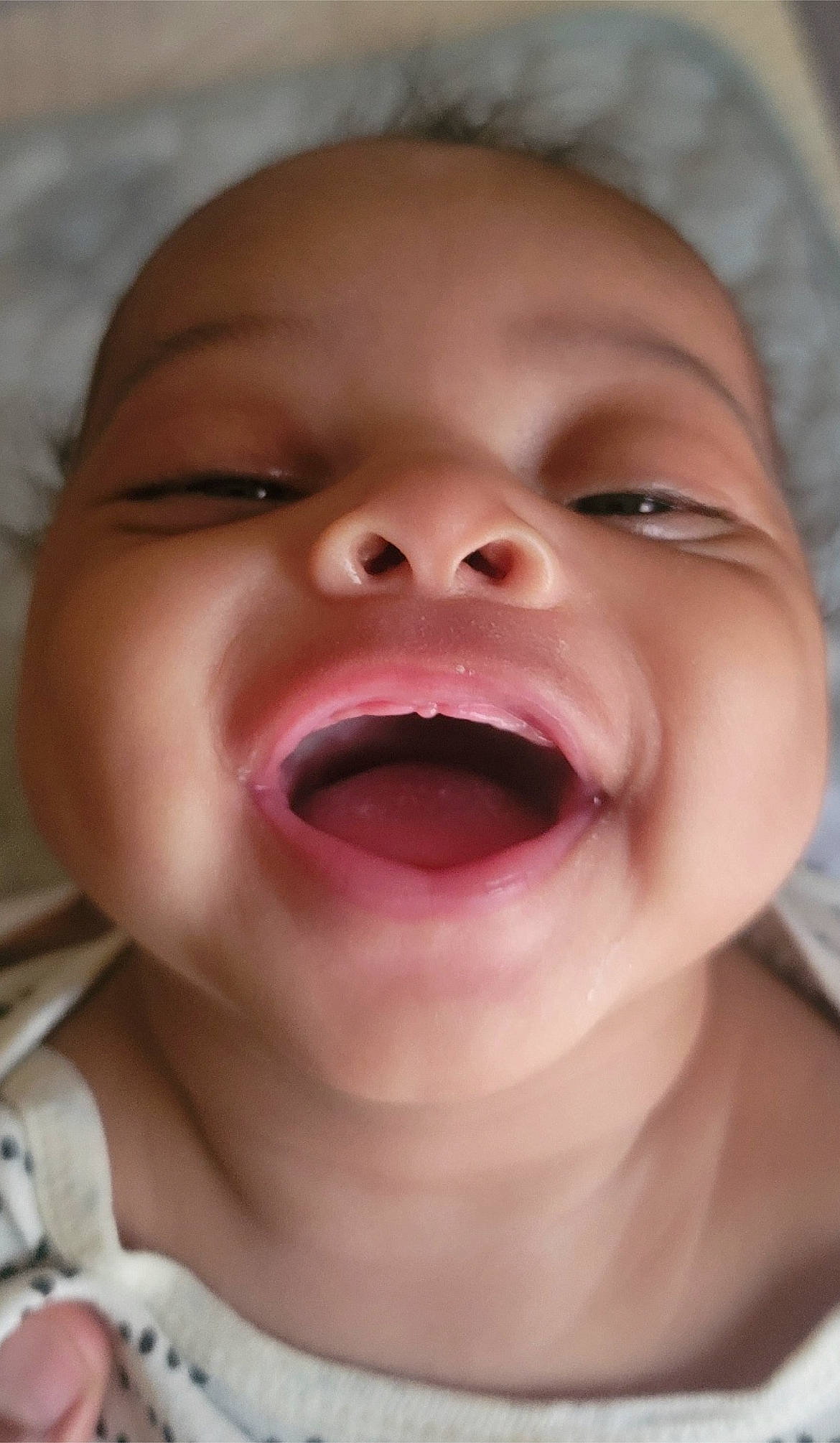 Tynita is registered to the contest to win money with this photo: baby, cheek, child, chin, close_up, event, eyebrow, eyelash, fun, happy, iris, jaw, lip, mouth, nose, person, skin, smile, toddler, tongue