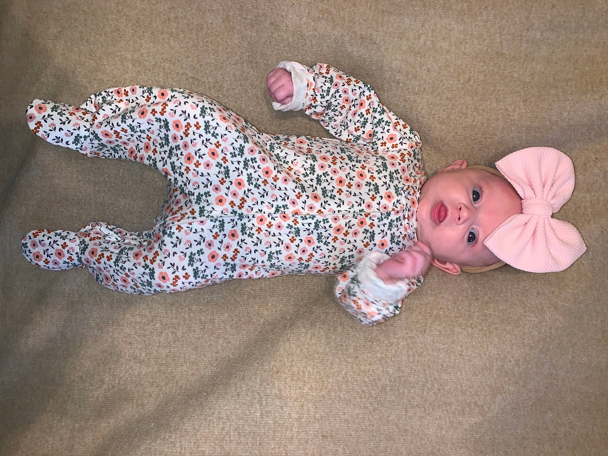 Paisley is registered to the contest to win money with this photo: arm, baby, baby_products, baby_toddler_clothing, baby_toys, carmine, comfort, craft, doll, fashion_accessory, flooring, head, headwear, human_body, human_leg, leg, pattern, person, stuffed_toy, toddler
