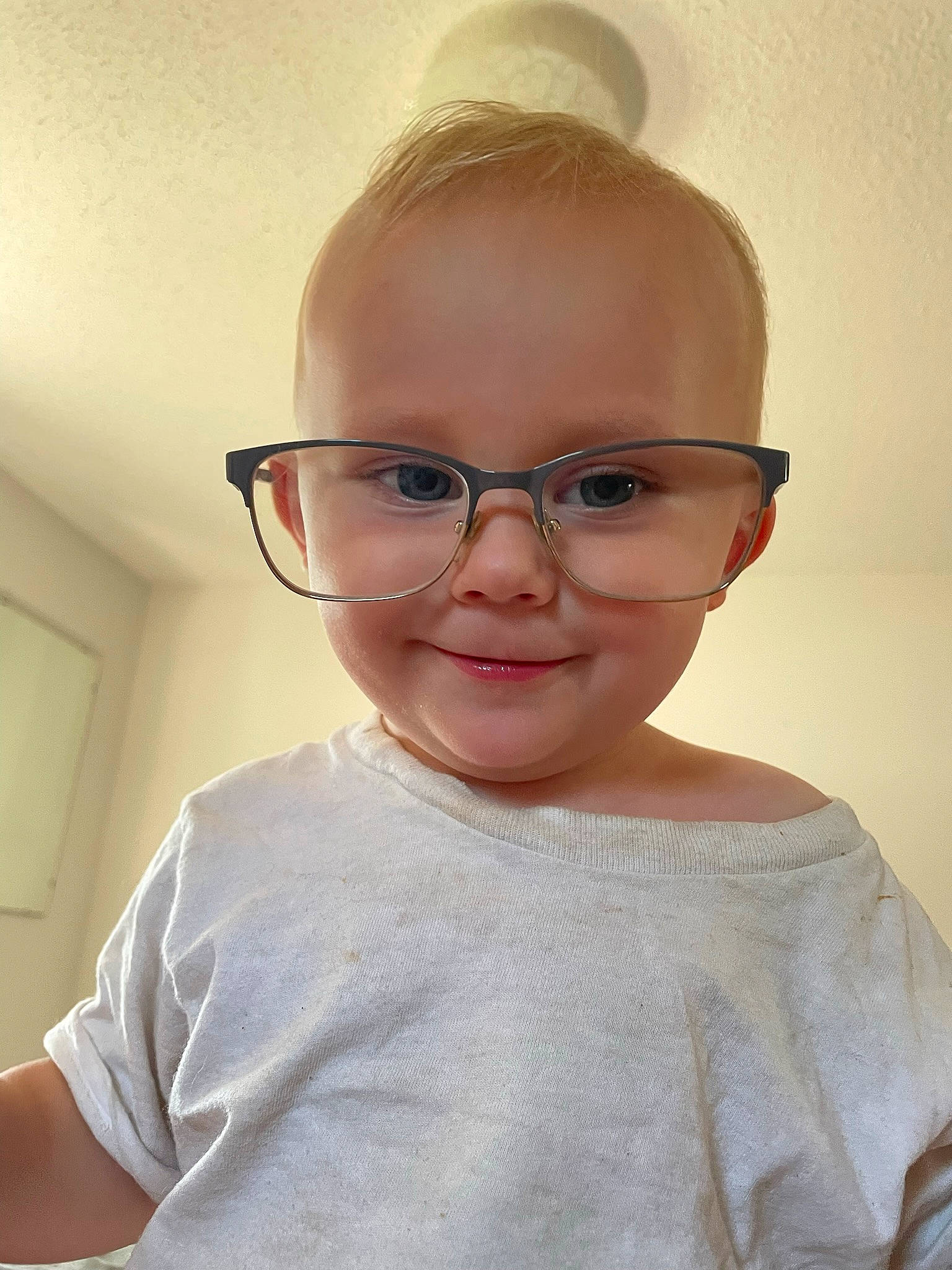 Ambrose is registered to the contest to win money with this photo: baby, baby_toddler_clothing, cheek, collar, eyebrow, eyelash, eyewear, forehead, glasses, happy, iris, jaw, joy, lip, nose, person, skin, sleeve, smile, toddler