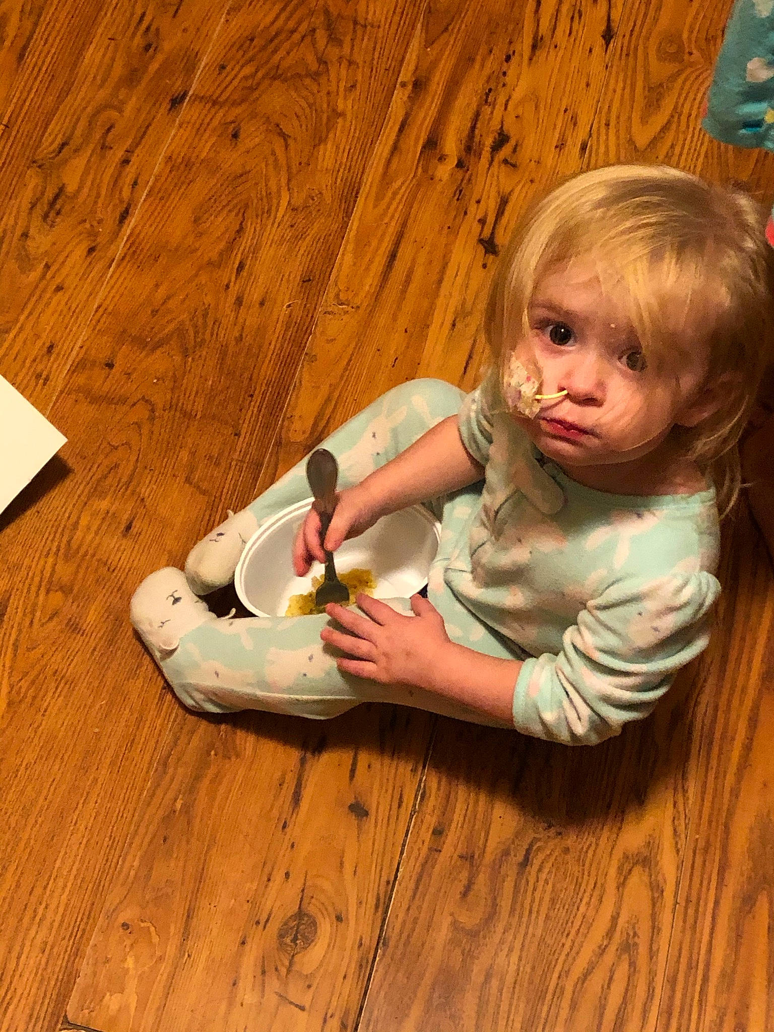 Aspen is registered to the contest to win money with this photo: baby_toddler_clothing, brown, comfort, fawn, floor, flooring, foot, fun, happy, hardwood, human_leg, laminate_flooring, long_hair, person, skin, sock, toddler, varnish, wood, wood_flooring