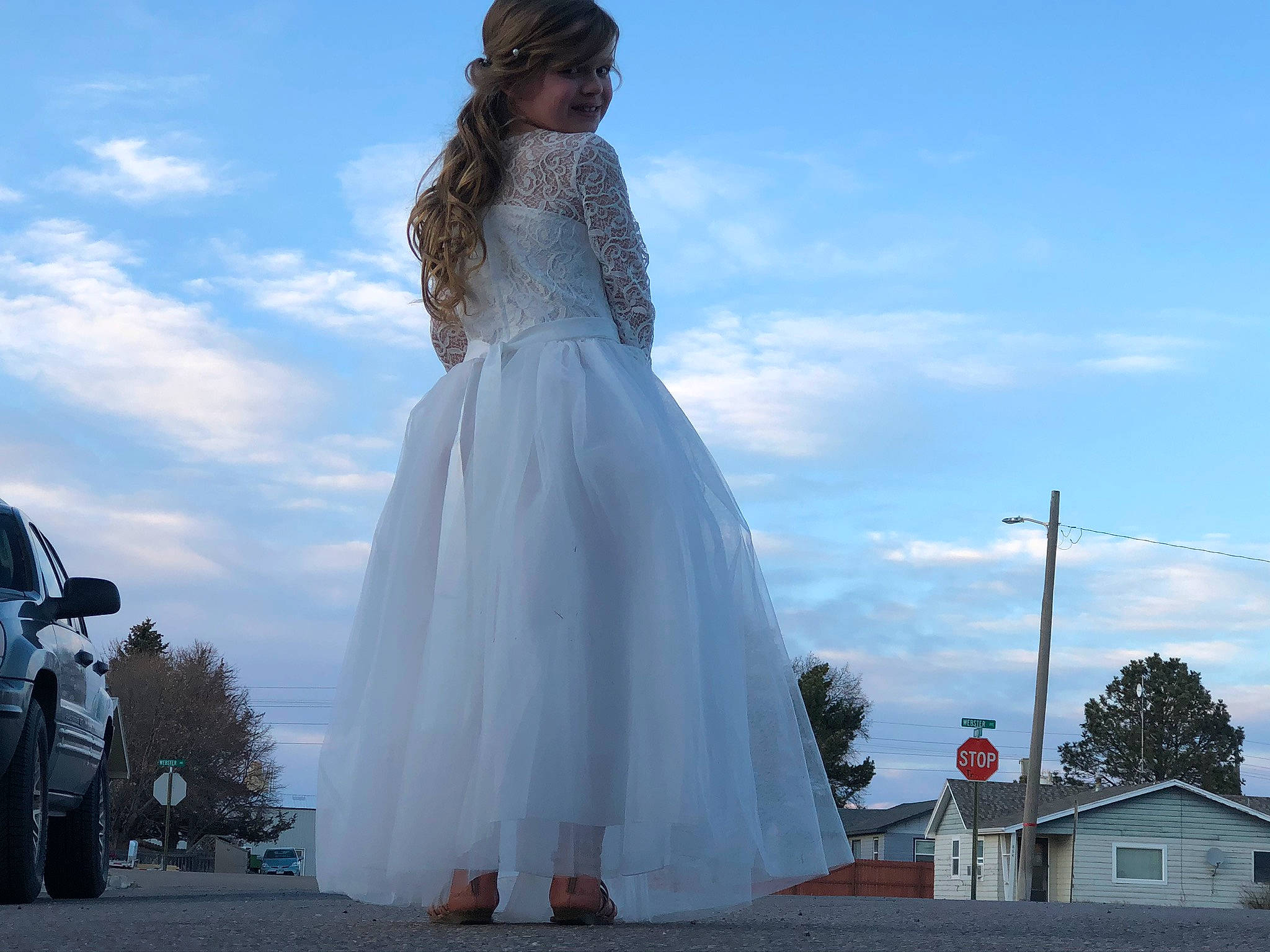 Bailey is registered to the contest to win money with this photo: bridal_accessory, bridal_clothing, bridal_party_dress, bride, cloud, dress, fashion_design, fashion_model, flash_photography, formal_wear, gown, happy, joy, one_piece_garment, person, shoulder, sky, sleeve, street_fashion, waist