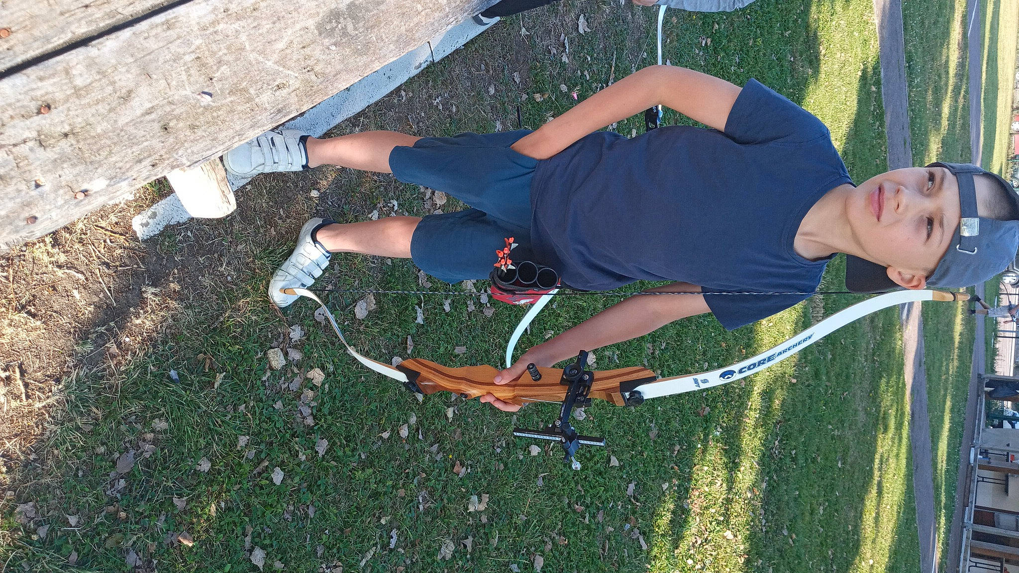 Edward participe au concours pour gagner de l'argent avec cette photo : asphalt, electric_blue, fun, grass, headwear, human_leg, knee, lawn, leg, leisure, outdoor_recreation, people_in_nature, person, recreation, road_surface, shoe, sneakers, thigh, tire, tree