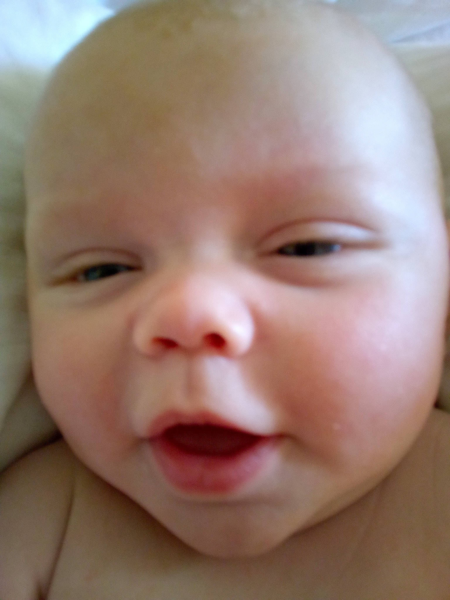 Zander is registered to the contest to win money with this photo: baby, baby_toddler_clothing, cheek, child, close_up, eyelash, happy, iris, lip, neck, nose, person, portrait_photography, skin, smile, toddler