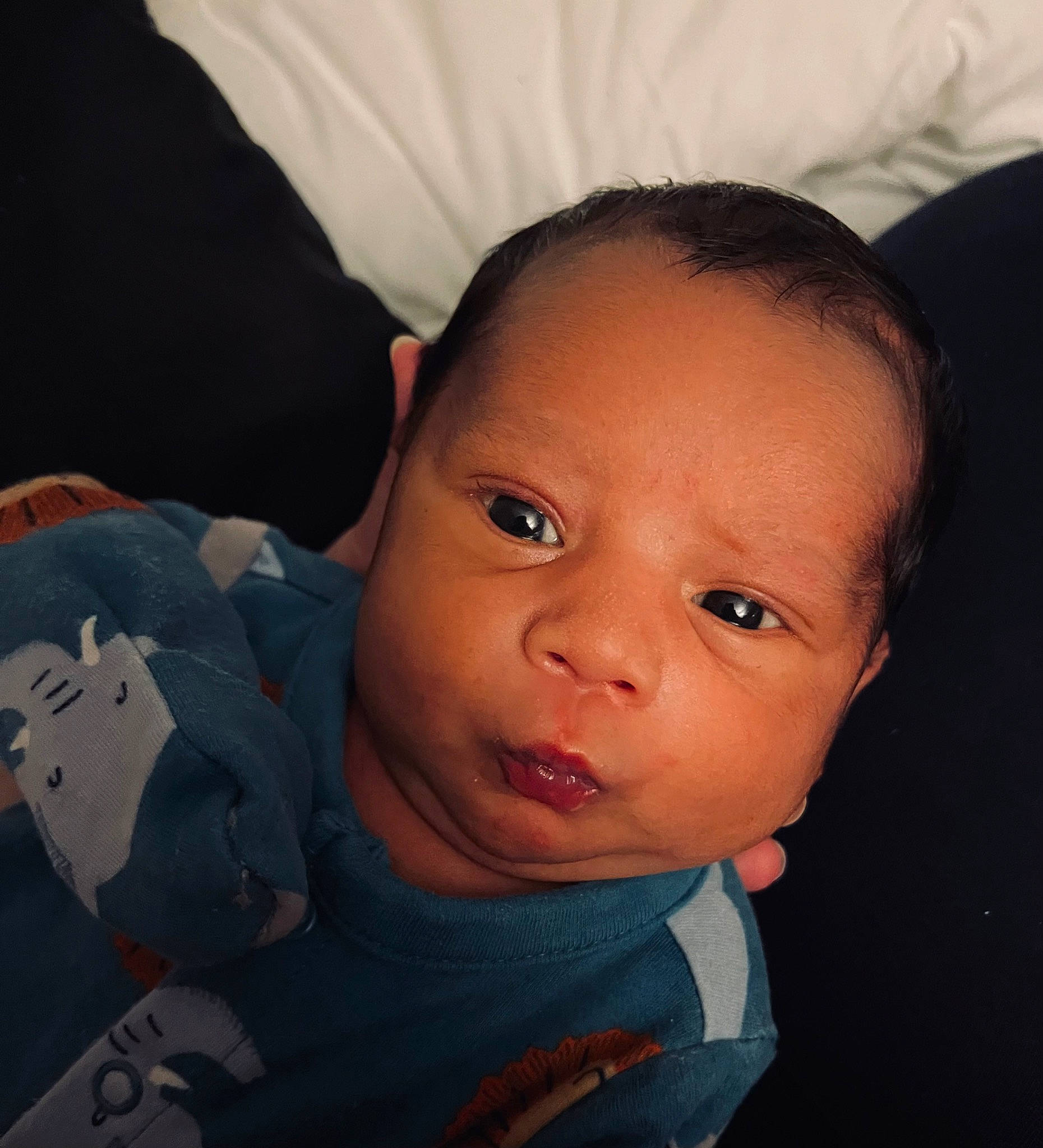 Samson is registered to the contest to win money with this photo: baby, baby_toddler_clothing, cheek, cloud, comfort, ear, eyebrow, eyelash, flash_photography, forehead, gesture, happy, iris, lip, mouth, nose, person, skin, sleeve, smile