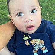 Noah joined the competition — help win amazing prizes! baby, infant, child, outdoor, grass, person, navy_shirt, bear_design, cute, wide_eyes, curious, hand, arm, digital_sticker, hearts, cartoon, holding, portrait, casual_clothing, young