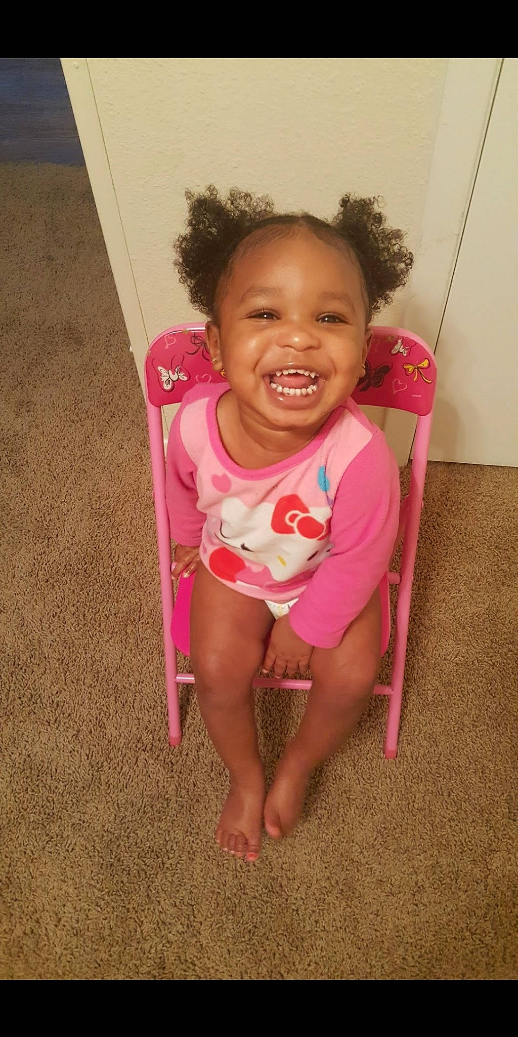 Kailee is registered to the contest to win money with this photo: beauty, child, day, eye, facial_expression, fun, girl, hairstyle, happiness, infant, joy, leg, magenta, person, pink, play, red, sitting, skin, smile