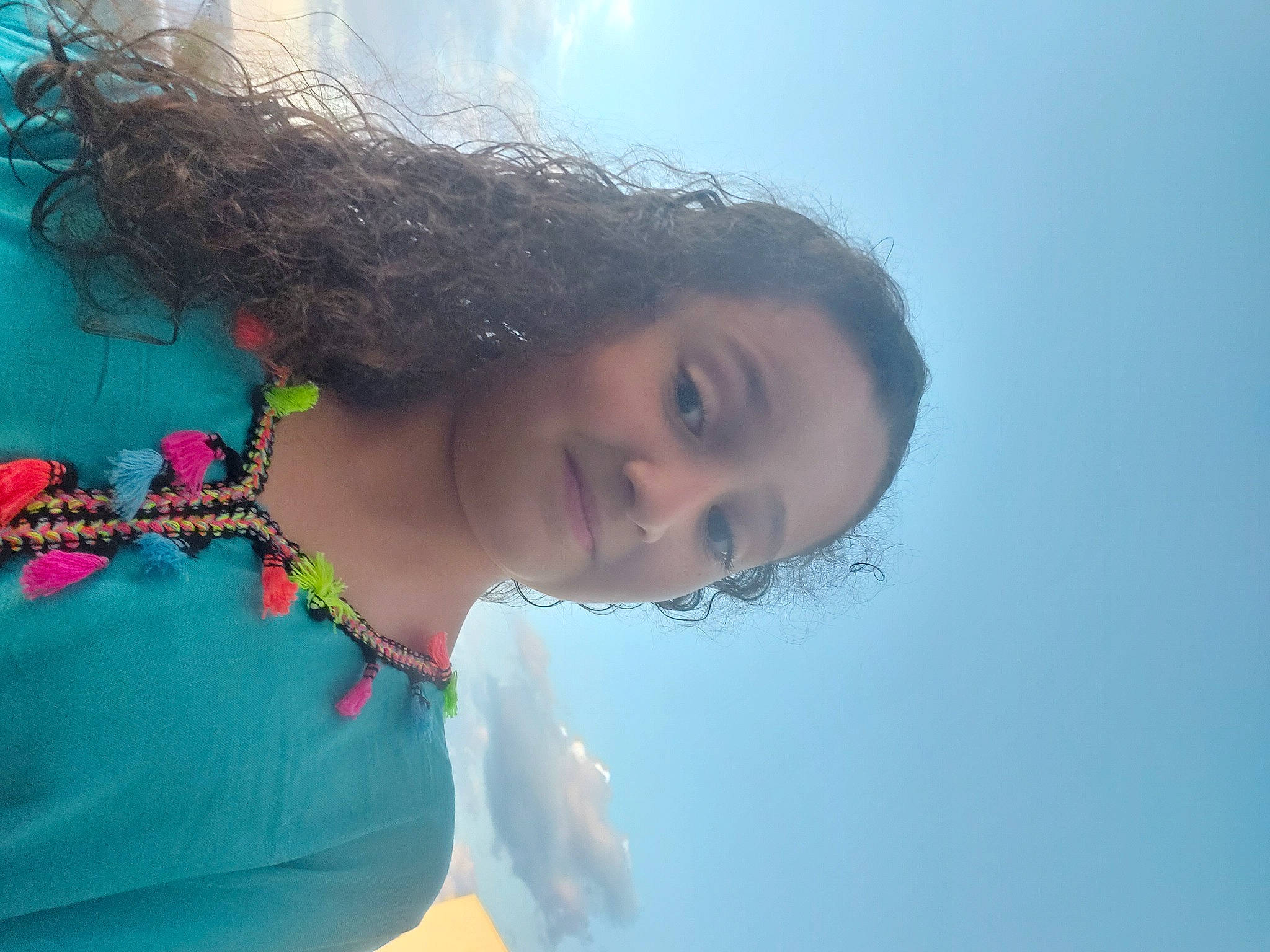 Maïssa participe au concours pour gagner de l'argent avec cette photo : black_hair, cloud, cool, eye, eyebrow, flash_photography, hair, happy, head, joy, leisure, lip, long_hair, neck, people_in_nature, person, shoulder, skin, sky, smile