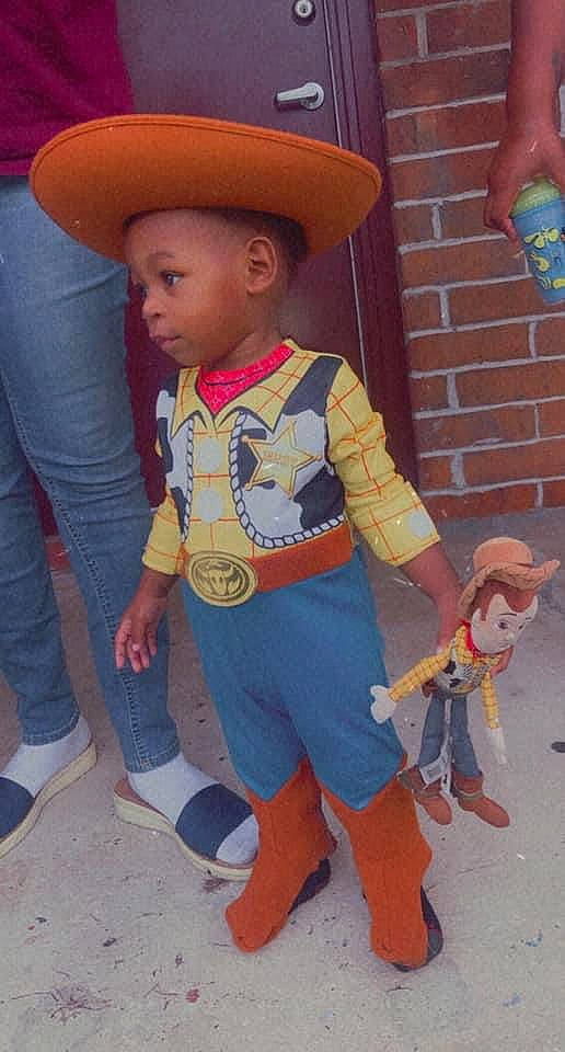 Casen joined the competition — help win amazing prizes! baby_toys, belt, costume, costume_accessory, costume_hat, cowboy_hat, denim, fedora, fictional_character, hat, jeans, joint, leg, overall, person, pocket, sock, sun_hat, toy, trousers