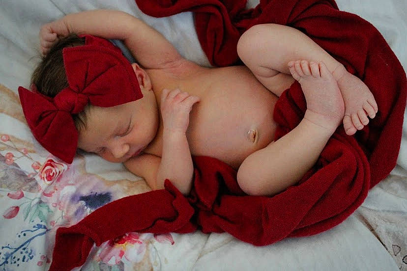 Hazel is registered to the contest to win money with this photo: abdomen, arm, baby, baby_sleeping, chest, comfort, eye, finger, glasses, hand, human_body, leg, mammal, mouth, muscle, person, pink, skin, stomach, thigh