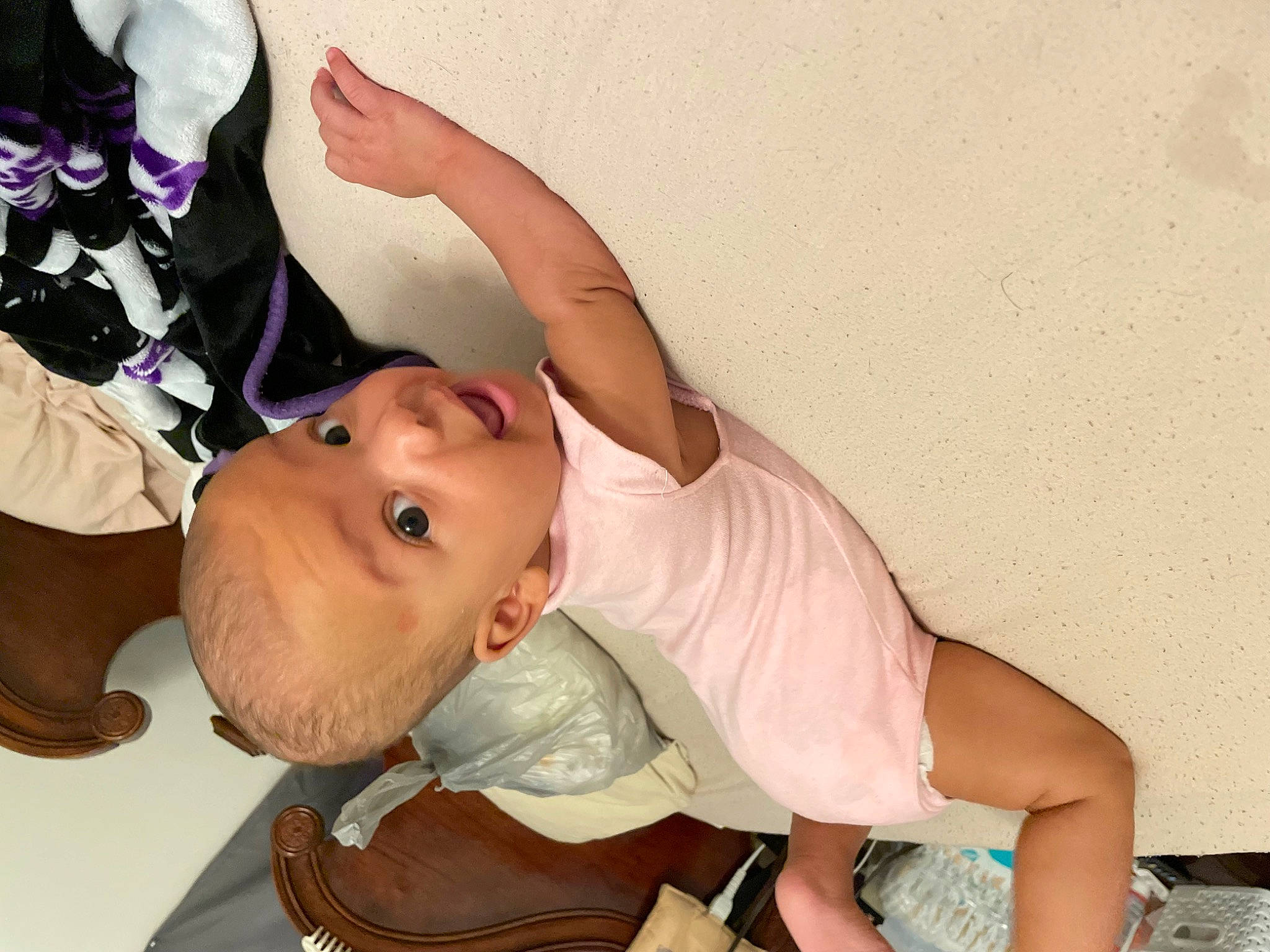 Heaven is registered to the contest to win money with this photo: abdomen, baby, baby_products, baby_toddler_clothing, cheek, chest, child, comfort, elbow, finger, foot, fun, happy, human_leg, knee, mouth, musical_instrument, person, sitting, surprise