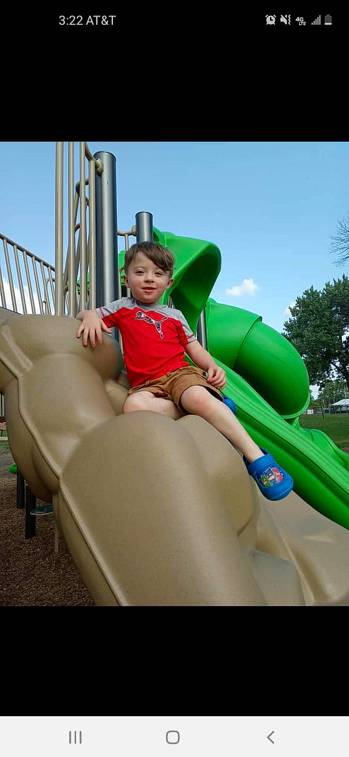 Brently joined the competition — help win amazing prizes! child, chute, city, cloud, comfort, fun, happy, human_body, human_leg, joy, leisure, outdoor_play_equipment, person, play, playground, playground_slide, recreation, sitting, sky, thigh