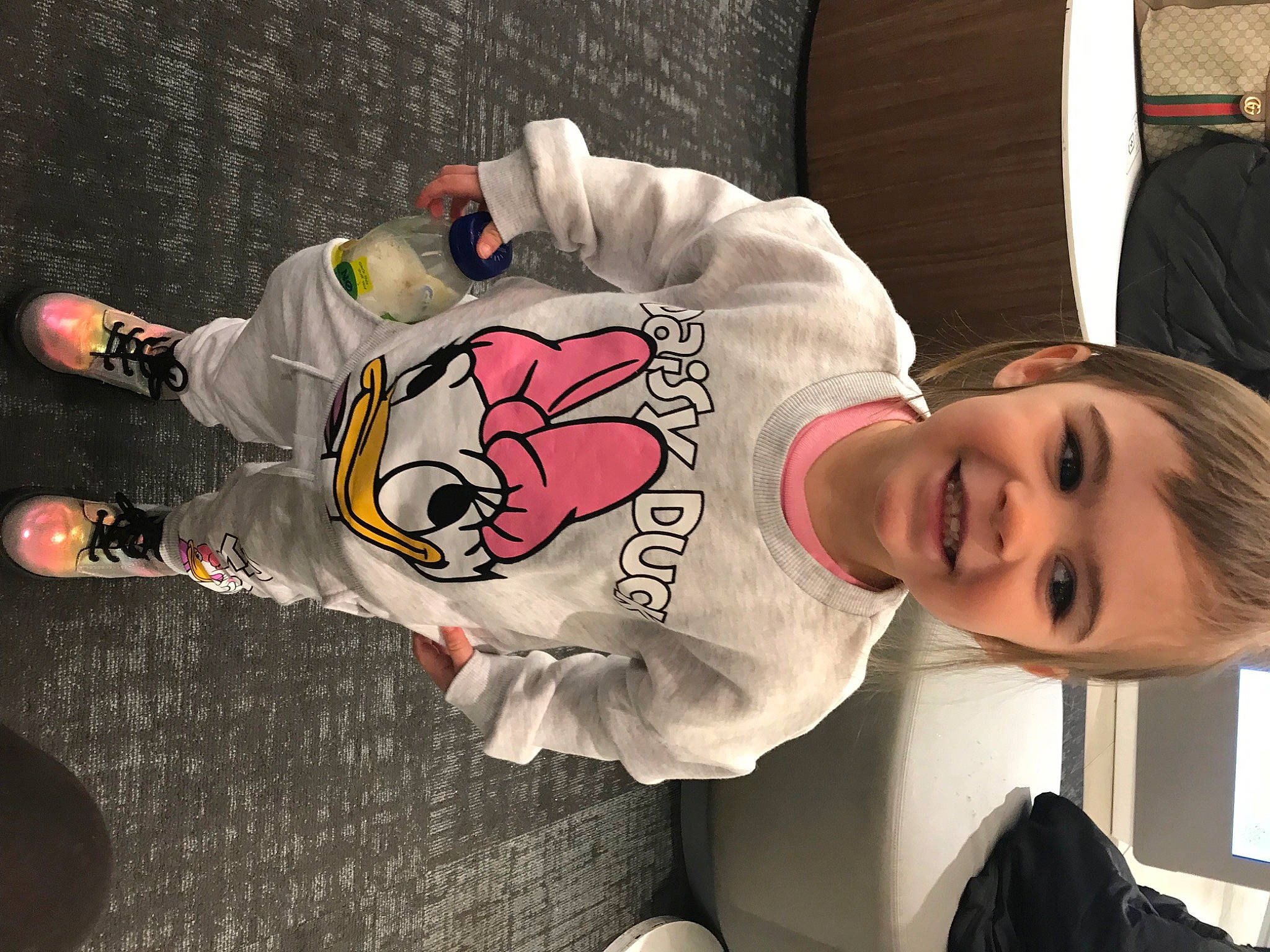 Chelsea joined the competition — help win amazing prizes! baby, baby_toddler_clothing, carmine, child, comfort, cool, fun, happy, joy, person, room, sitting, sleeve, smile, toddler, walking_shoe, white