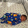 Jakai joined the competition — help win amazing prizes! baby, blanket, blue_clothing, child, cozy, crib, curly_hair, face, indoors, infant, lying_down, mattress, newborn, nursery, planets, portrait, sleeping, space_pattern, stars, textile